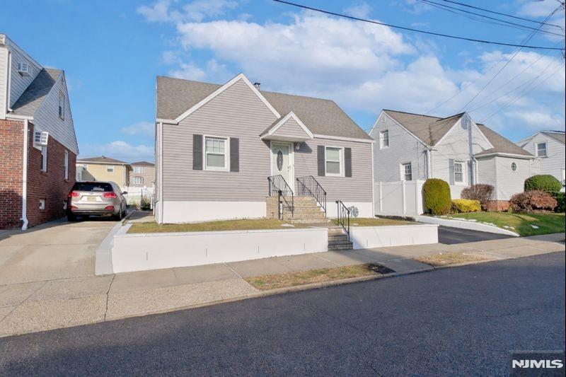 Welcome to 207 Lafayette Ave, Lyndhurst. This affordable and move-in-ready home offers a flexible and functional layout ideal for todayâ€™s living. The main level features 2 Bedrooms, while the second floor offers 2 additional Bedrooms, providing space for a variety of living arrangements. The finished basement adds valuable bonus space and includes a Half Bath and a built-in bar, perfect for entertaining, recreation, or relaxing at home. The kitchen provides access to the backyard that features a covered patio and a large recreation area, creating a seamless indoor-outdoor connection. Enjoy a large backyard ideal for gatherings, gardening, or outdoor enjoyment, along with a storage shed for added convenience. A long driveway offers ample off-street parking. It is conveniently located near shopping, parks, schools, public transportation, and major highways, making commuting and daily errands easy. A great opportunity to own in Bergen County and at an accessible price point. Affordable, well-located, and ready to move in. Schedule your private drop by today; We will meet you at the front door. Siding & roof replaced in 2022.
