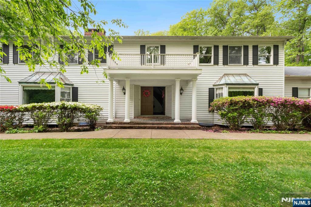 Set in the prestigious Saddle River community, 75 Woodcliff Lake Road presents a rare opportunity to renovate, expand, or reimagine a classic center hall colonial originally built in 1967. Offering substantial interior space and timeless architectural character, this estate-style residence provides the perfect canvas for creating a truly exceptional home tailored to your vision. The property offers expansive indoor and outdoor living opportunities, featuring a nearly Olympic-sized swimming pool and a private tennis/basketball court, ideal for entertaining, recreation, or creating your own private retreat. Whether preserving its classic charm or transforming it with a modern design approach, the possibilities are endless. With generous living spaces and a flexible layout, this home offers versatility to suit a variety of lifestyle needs while delivering the privacy and setting Saddle River is known for. Conveniently located near major highways, shopping, dining, parks, and local amenities, Saddle River offers a peaceful residential setting with convenient access to New York City and surrounding Bergen County destinations. This is an estate sale and the property is being sold strictly AS IS.