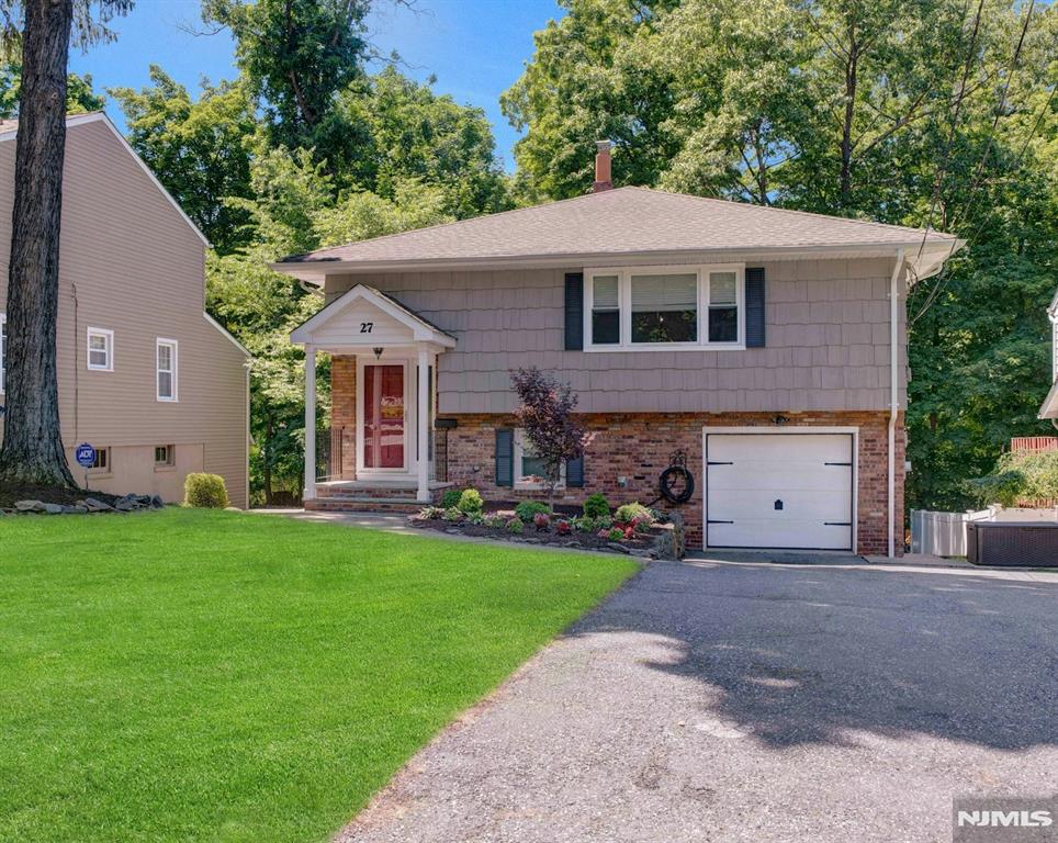 Welcome to Packanack Lake, where lifestyle meets location! This beautifully maintained 3-bedroom, 2-bath Bi-Level offers the perfect blend of comfort and community living just three short blocks from the lake. Freshly painted and move-in ready, the home features hardwood floors, crown molding, granite countertops, a mobile center island, and a breakfast bar accented with stylish pendant lighting. The spacious lower level flaunts brand-new ceiling tile, with patio doors leading to a huge deck with a privacy fence perfect for entertaining, basking in the sun or relaxing outdoors. Enjoy all that Packanack Lake has to offer, including swimming, beaches, parks, playgrounds, boating, fishing, and year-round community activities, with golf and tennis also available. House is being sold As-is with no known issues. A lifestyle like no other awaits!