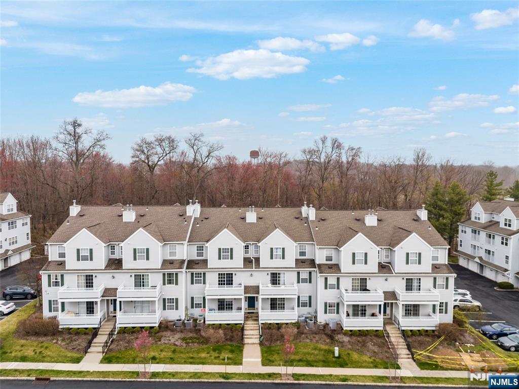 Situated in the highly desirable community of Eden Lane this beautiful condo offers a fantastic blend of comfort, convenience, and amenities. Residents can enjoy access to a swimming pool, playground, and other community perks. This bright and airy unit boasts 1 bedroom, 1.5 baths, and a versatile bonus room or office on the first level, perfect for remote work or additional living space. The galley-style kitchen is efficiently designed and located next to the dining area, allowing for easy entertaining. Large windows throughout the home bring in an abundance of natural light, enhancing the warm and inviting atmosphere. The spacious primary bedroom features a generous full bathroom, providing a private retreat. A laundry area within the unit adds additional convenience. With its prime location, this condo is perfect for commuters, offering quick access to major highways, shopping centers, restaurants, and everyday conveniences.