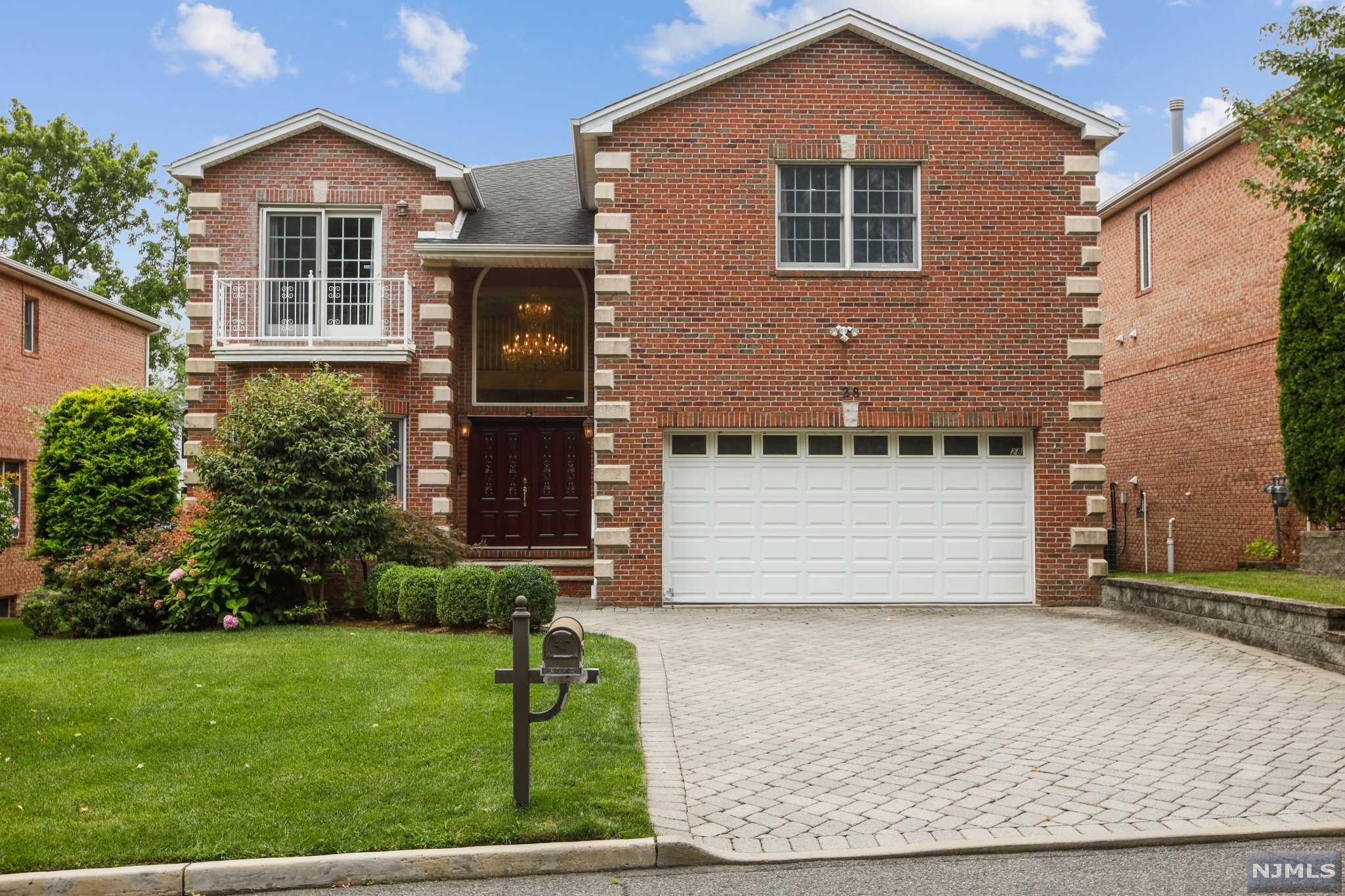 BEAUTIFUL ALL BRICK CENTER HALL COLONIAL LOCATED ON A PRIVATE STREET IN ENGLEWOOD CLIFFS. VERY WELL KEPT HOME WITH A LOT OF NATURAL LIGHT. MARBLE ENTRY FOYER W/HUGE WINDOWS LEADING TO LIBRARY, FORMAL DINING ROOM, STEP-DOWN GREAT ROOM W/FIREPLACE. MODERN EAT-IN KITCHEN FEATURES BREAKFAST AREA, CENTER ISLAND, GRANITE COUNTER TOPS WITH HIGH END APPLIANCES & SLIDING DOOR TO DECK. OFFICE AND LAUNDRY ROOM ON THE 1ST FLOOR. HARD WOOD FLOORS THROUGHOUT. 2ND FLOOR FEATURES MASTER SUITE WITH MASTER BATH & JACUZZI/2 WALK-IN CLOSETS. GUEST ROOM W/ EN-SUITE BATHROOM AND LITTLE BALCONY, 2 ADDITIONAL BEDROOMS AND JACK & JILL BATHROOM, AND COZY LOUNGE. FULL FINISHED WALK OUT BASEMENT WITH HIGH CEILINGS, PLAY ROOM, ENTERTAINING ROOM, & ONE BEDROOM WITH FBATH. VERY CLOSE TO GW BRIDGE & HIGH WAY , EXCELLENT SCHOOL SYSTEM WITH LOW TAXES!!CONVENIENT TO EVERYTHING!