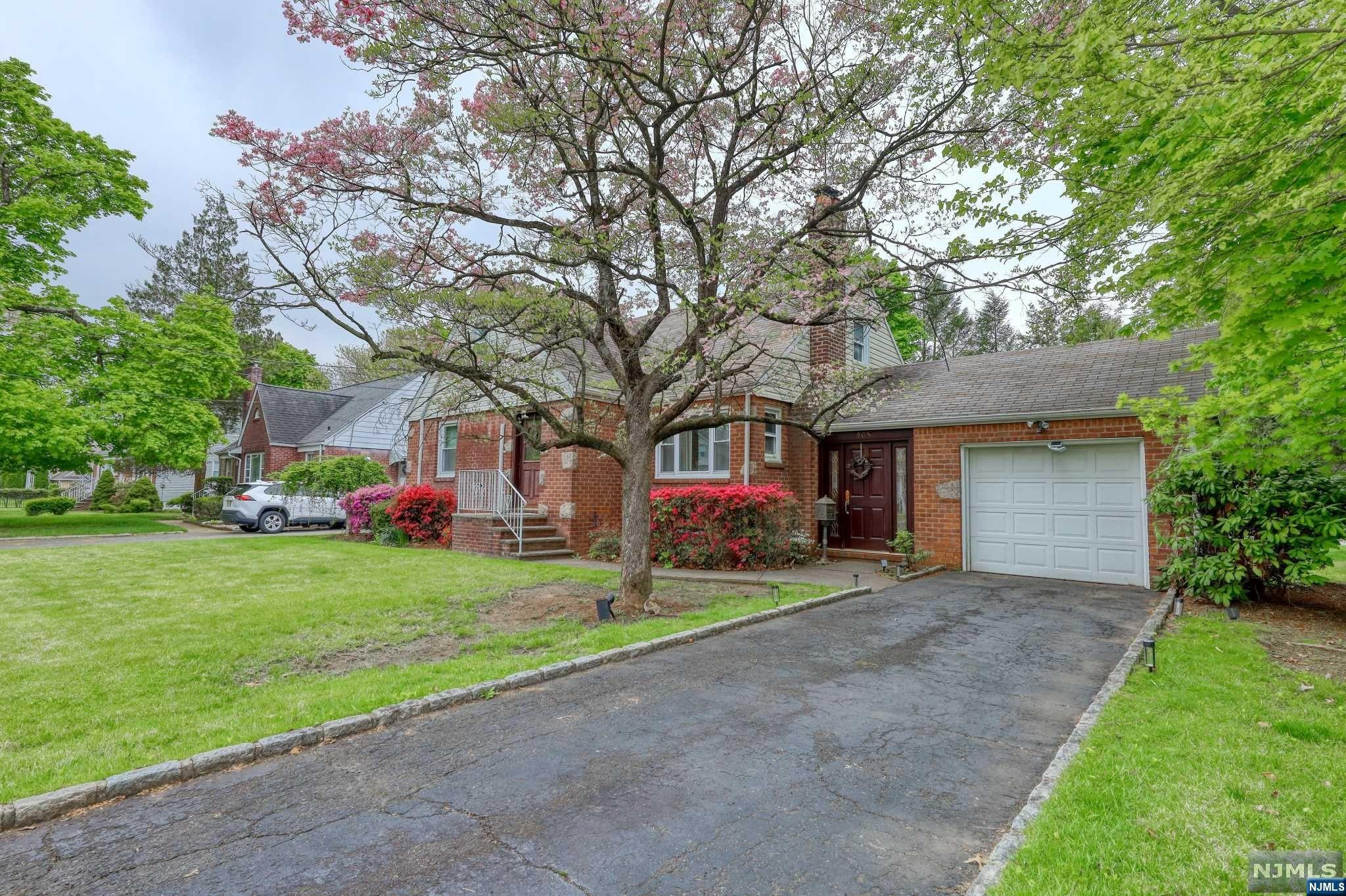 Well-kept dormered cape. Multiple split zones, air conditioning systems throughout. Hardwood floors. Attached garage. Large yard. First floor, offers living room, dining room, two bedrooms, full bath, kitchen. Second floor, offers large bedroom, full bath, skylights, seating area. Full basement. Huge backyard that face the back street.