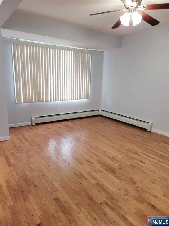 Beautiful hardwood floors, a nice sizable floor Plan great for everyday living. Upon entering the home, you will find a good size living room, a very spacious formal dining room and Large Eat-in kitchen that offers plenty of cabinets & Granite counters along with Stainless Steel appliances. The Second floor offers 2 very nice sized bedrooms with great closet space and 1 full bath. The third floor is a full walk-up attic, enough space for a bonus room, exercise room or more storage! The basement is offering a full bath & tons of storage and laundry room. Great location near schools, shopping, park, NYC transportation and highways. The photos from previous before the rent.