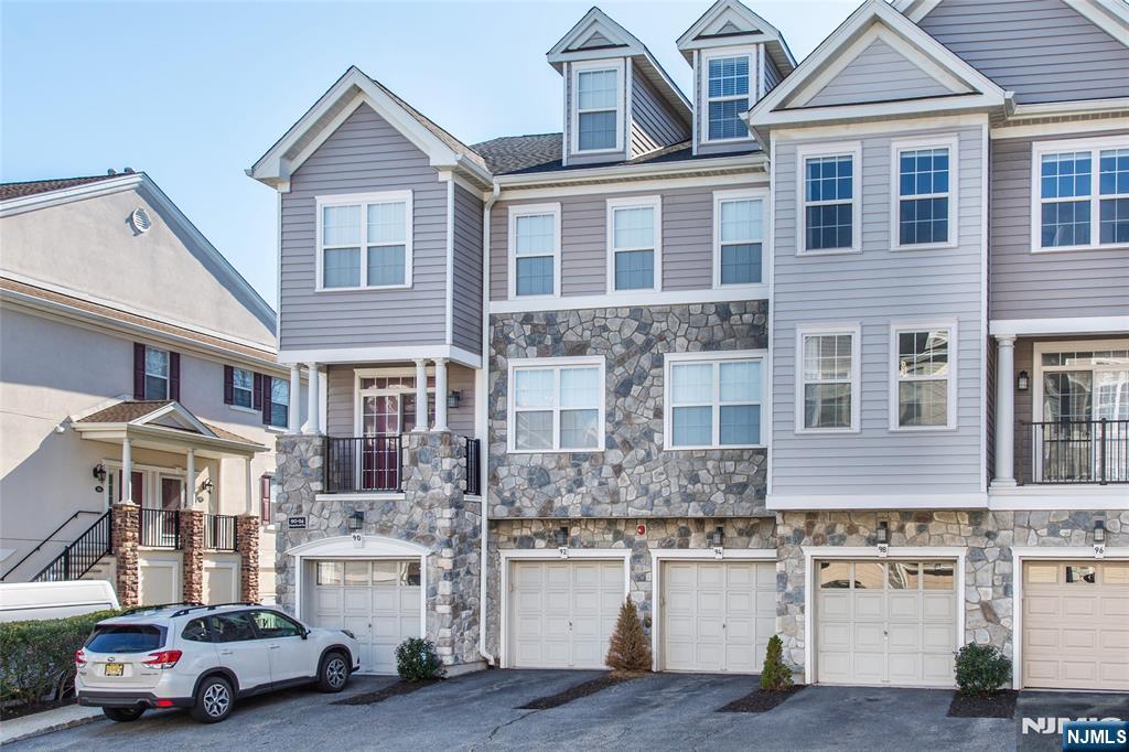 Welcome to this elegant ground level Stratton model unit in desirable gated Cambridge Crossing community! This condo boasts an open floor plan concept with large windows with custom shutters beaming natural sunlight creating a sooth and warm environment. Kitchen is equipped w/SS appliances, breakfast nook w/island seating and plenty of cabinets for storage. Spacious living room, beaming hardwood floors, gas fireplace. Formal dining room open to the kitchen and living room, great for entertaining! Primary suite, walk-in closet w/built-ins, en-suite bathroom w/soaking tub and stall shower (shower doors stored in garage). More features include: Second bedroom, main full bathroom, welcoming entrance vestibule, laundry room, attached garage, high ceiling, sophisticated trim/molding throughout, newer HVAC unit, patio, end unit for privacy. Easy access to major highways, NYC transportation, shopping, dining and more! Amenities include security w/gate, fitness center, pool and clubhouse. This unit truly has it all!