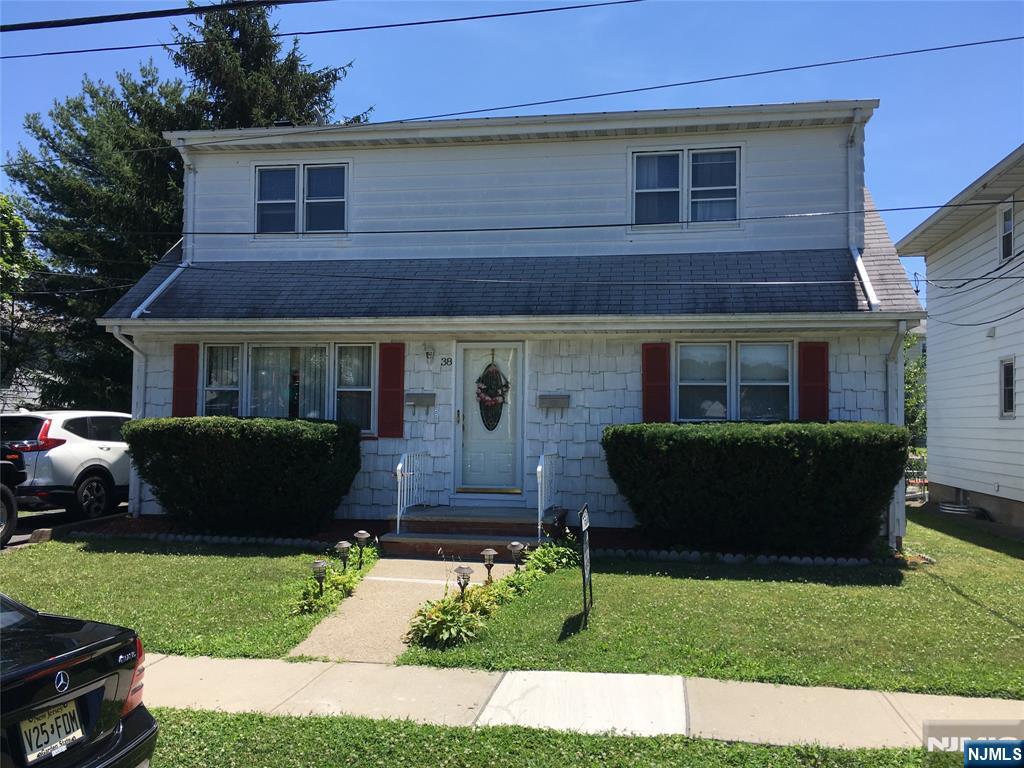 Cared for 2 family style home overlooking Samuel Braen Memorial Park. 1st floor features spacious living room, dining room (potential for creating a 3rd bedroom), eat-in-kitchen, 2 bedrooms and full bath. Upstairs apartment has living room, eat-in-kitchen, 2 bedrooms and full bath. Full, partially finished basement with Bilco door walkout. Nice rear yard with patio for relaxing. Driveway can fit close to 3 cars in tandem. All separate utilities except cold water. Both Tenants in each apartment are on a month to month agreement. No leases.