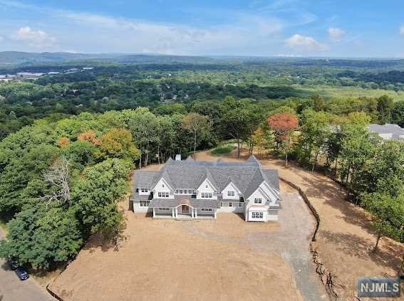 Luxurious living could be all yours in this incredible custom home, built on the last approx 2 acre lot available on Shinnecock Trail. Offering the added value of being twice the size of the area's typical 1-acre parcels. This estate is located on one of the most expensive, prestigious streets in town and surrounded by upscale residences. Treating you to an impressive +/-10,000 sq ft of impeccably designed interior across two levels, this is an exceptional estate. Tree-lined and secluded, there's an expansive, inviting outdoor living area that's ideal for hosting parties or alfresco dinners. A brand new swimming pool with a spa completes the space, helping to create a private, tranquil oasis in which endless hours of relaxing and entertaining guests await.
