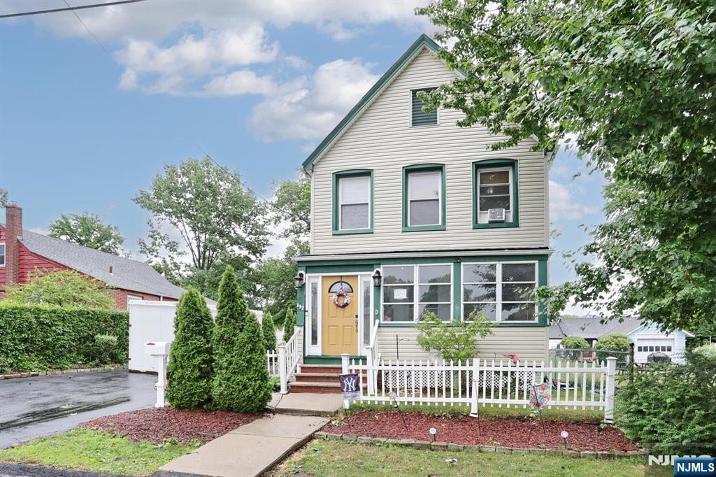 Lovely, well-maintained Colonial located on tree lined street. Convenient to transportation and parks.