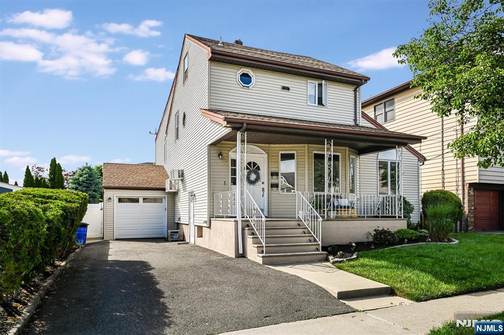 PLEASE CALL LISA AT 973-879-6306 FOR A PRIVATE SHOWING. DON'T MISS THIS INCREDIBLE OPPORTUNITY TO OWN THIS BEAUTIFUL TWO FAMILY HOME IN CARLSTADT !! Unit one offers two spacious levels of living space and feels like a single family home. The first floor features an open-concept living room, dining room and updated kitchen with an island; soaring ceilings and abundant windows that fill the home with natural light. A cozy gas fireplace creates the perfect atmosphere for chilly evenings. This level also includes two generously sized bedrooms and two full bathrooms, including a private ensuite. Sliding glass doors lead to a balcony, patio and stunning saltwater pool with a waterfall. An ideal setting for entertaining and outdoor enjoyment. The second floor is dedicated to an expansive primary bedroom retreat complete with a beautifully renovated ensuite bathroom. Providing a private and luxurious escape. Unit 2 is filled with charm and character, featuring hardwood floors throughout a bright and airy layout. An open concept eat-in kitchen and living room, one bedroom and a full bathroom. A large attic provides additional storage space or perhaps other potential possibilities. Situated on a lovely tree-lined street in sought after Carlstadt, this home is conveniently located near excellent restaurants, shopping and transportation to New York City. A rare opportunity to own a versatile, and well-maintained two family property in a prime location. Welcome Home.