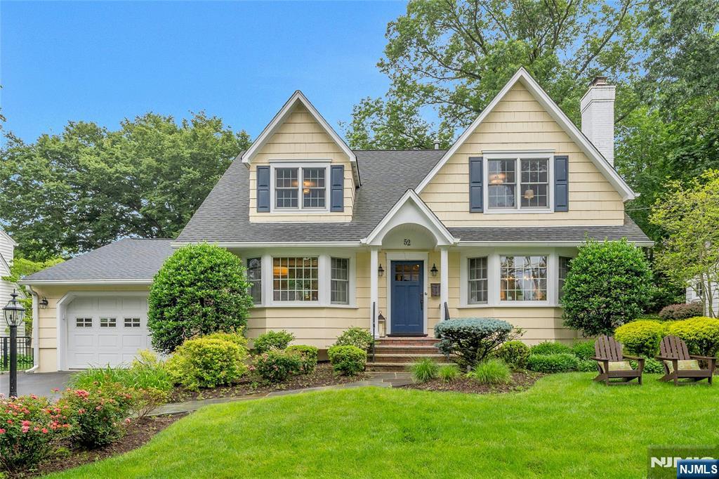 Curb appeal galore! Welcome to this beautiful impeccably maintained five bedroom, 3 full, two half bath home in desirable neighborhood. Spacious rooms throughout: special features include kitchen with center island seating as well as dining area opening to family room with fireplace: both rooms overlook lush level landscaped yard with expansive patio. Fully finished lower level with second family room, music and exercise rooms, powder room and laundry. Special features first floor bedroom with full bath close by, bay windows, custom molding and built-ins, bedrooms with double closets, recessed lighting, hardwood floors, additional outdoor lighting, fully fenced yard and multi-zone air conditioning and heating. Located close to downtown, school and NYC transit. A Glen Rock Gem! downtown, school and NYC transit. A Glen Rock Gem!