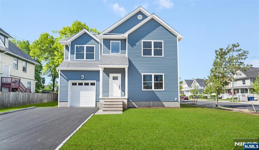 Welcome to this amazing new construction with so many features and possibilities. As you enter this home you will enjoy an open concept starting in the Living room with a sleek gas Fireplace continuing into the Dining Room and beautifully laid out Kitchen with a center island. Here you will find bright countertops and nice fixtures. This space will leading you to a back covered deck welcoming you to the back/side yard. Also from this open space you will have access to a half bath it will also lead you down to the garage entrance and basement. Here enjoy the high ceilings, utility room and a full bath. As we make our way to the second floor you will find 4 bedrooms, 2 full baths with double sinks and a convenient laundry closet. The Primary Bedroom on the second level is a generous size and boasts a nice size closet ready to make your own and its own full bath with some gorgeous features like a lovely tiled shower area. The corner lot gives lots of outdoor possibilities of use and also an attached 1 car garage. In the heart of Plainfield just minutes from the train station giving you many possibilities of commuting to NYC or access to many major highways. Be part of what Plainfield has to offer.