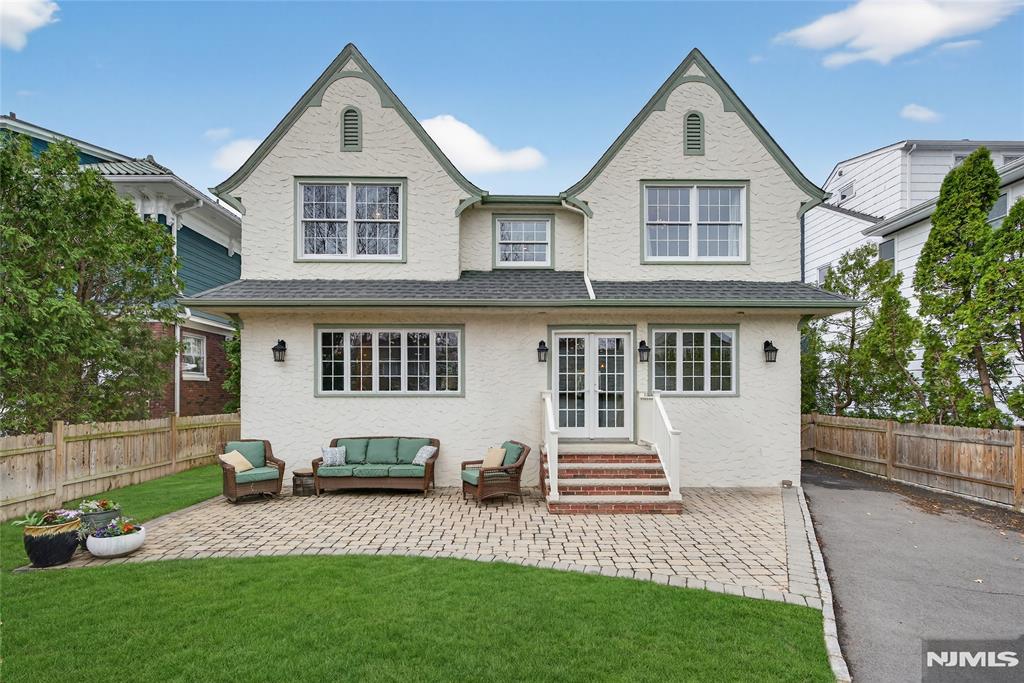 Ideally located in the desirable South Mountain neighborhood just blocks from the Midtown Direct train to NYC, top-rated schools, Taylor Park and vibrant downtown, this expanded custom home offers 4 bedrooms and 3.5 bathrooms blending timeless charm with modern updates. The open-concept layout features hardwood floors, crown molding, and abundant natural light throughout. The inviting living room showcases a wood-burning fireplace with a custom marble mantel. The chefâ€™s eat-in kitchen (2021) is designed for everyday living and entertaining with crisp white shaker cabinetry, quartz countertops, Jenn Air 48â€ gas range, large center island, pantry and access to an oversized mudroom with built-ins, powder room access plus French doors leads to private backyard. The dining room seamlessly connects to both the kitchen and living areas. The spacious family room offers built-ins, window seating and the perfect setting for relaxation or game nights. Upstairs, the primary suite includes 2 closets and a beautifully appointed bathroom with Victoria & Albert clawfoot tub and large shower. 3 additional bedrooms feature custom closets, great natural light and access to a hallway bathroom and convenient 2nd floor laundry. The finished lower level includes a recreation room, office, flexible bonus space, full bath, multipurpose area and ample storage. The fenced backyard features a paver patio, newer driveway and access to a 2-car detached garage.