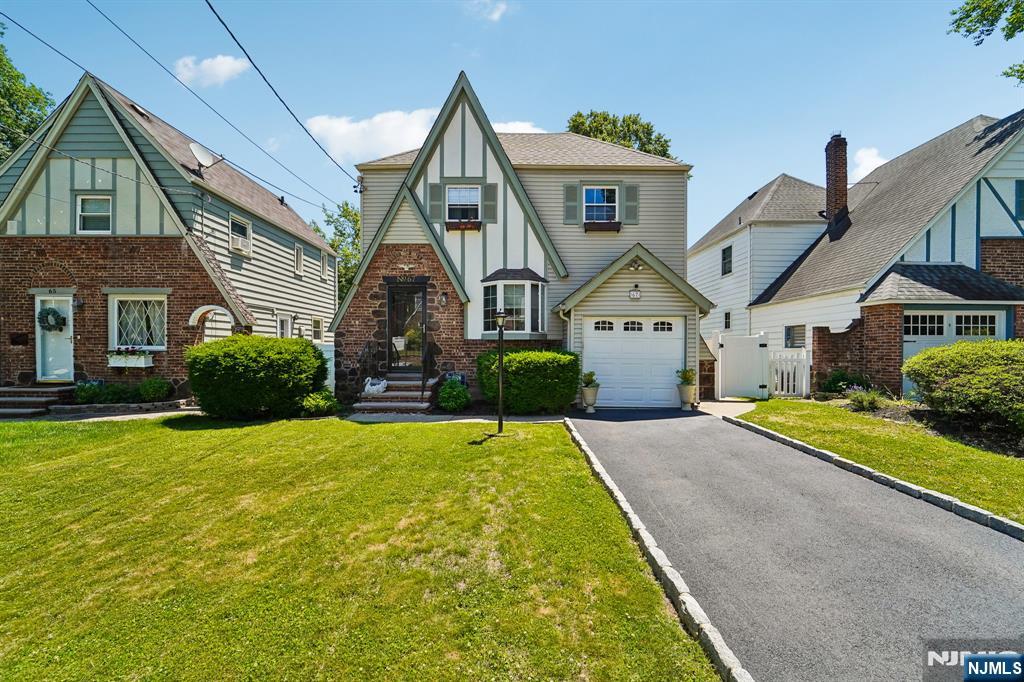 Experience the perfect blend of classic Tudor charm and modern living at 67 Marlboro Road. Thoughtfully renovated throughout, this exceptional 3-bedroom, 2-bath home showcases a designer-inspired kitchen, rich hardwood flooring, inviting dining spaces, and a versatile semi-finished basement. Additional upgrades include a whole-house water filtration system, providing enhanced water quality throughout the home. The backyard is a true private oasis, featuring a fully fenced yard, above-ground pool, and a unique putting green that creates an ideal setting for outdoor enjoyment and entertaining. Nestled in one of Cliftonâ€™s premier residential neighborhoods, just minutes from shopping, dining, major commuter routes, and less than 30 minutes from New York City, this home delivers the perfect combination of character, comfort, and convenience.