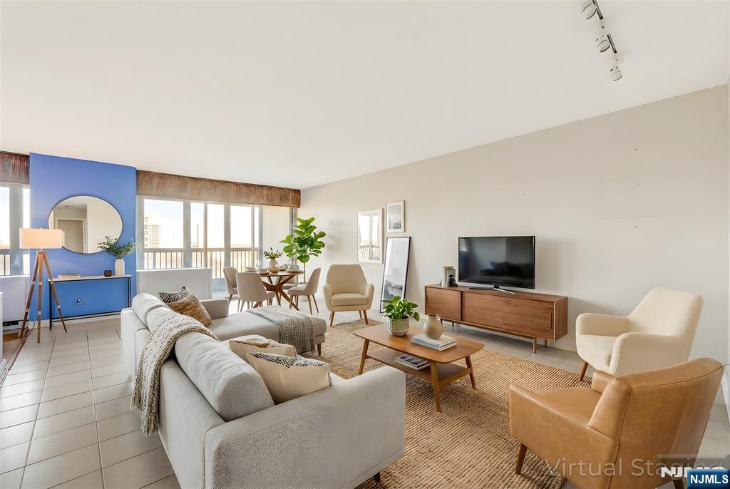 CONTACT DEBRA JACOBS & HALLEY NATKIN COLDWELL BANKER FORT LEE! ALL-INCLUSIVE FEES and a NYC commuter dream with iconic views. This rarely available oversized studio, approx. 816 square feet, offers a layout that converts cleanly to a true one-bedroom and sits in the highly sought-after Horizon House South Tower. The home features a renovated full bath, a separate dressing area with excellent storage, a cedar-lined walk-in closet, and hardwood floors, creating a bright and flexible living space. The showstopper is the massive 24-foot tiled terrace with a semi-permanent enclosure and floor-to-ceiling windows spanning the full length of the apartment. Enjoy sweeping, unobstructed views of the Hudson River and the George Washington Bridge from sunrise through nightfall. Monthly total fees are $1931(MAINT$1441.06,CBL/INT$71.54 ASSESS $350,Amenities $20,Park$48.40)and include maintenance,cable, internet,assessment,amenities,all utilities,and taxes. ONE PAYMENT! Field Parking Spot Transfers. Enjoy full-service living with a 24-hour doorman and security, fitness room, two outdoor pools, two tennis/pickle-ball courts, laundry rooms, childrenâ€™s play areas, a community room, and an on-site convenience store. Easy access to buses and major highways makes commuting to New York City fast and simple. Board approval required with a 4:1 income-to-debt ratio. Cash buyers must show a minimum gross income of $93K. Unit sold strictly AS-IS. *Some photos virtually staged.