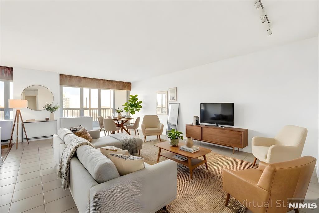 CONTACT DEBRA JACOBS & HALLEY NATKIN COLDWELL BANKER FORT LEE! ALL-INCLUSIVE FEES and a NYC commuter dream with iconic views. This rarely available oversized studio, approx. 816 square feet, offers a layout that converts cleanly to a true one-bedroom and sits in the highly sought-after Horizon House South Tower. The home features a renovated full bath, a separate dressing area with excellent storage, a cedar-lined walk-in closet, and hardwood floors, creating a bright and flexible living space. The showstopper is the massive 24-foot tiled terrace with a semi-permanent enclosure and floor-to-ceiling windows spanning the full length of the apartment. Enjoy sweeping, unobstructed views of the Hudson River and the George Washington Bridge from sunrise through nightfall. Monthly total fees are $1931(MAINT$1441.06,CBL/INT$71.54 ASSESS $350,Amenities $20,Park$48.40)and include maintenance,cable, internet,assessment,amenities,all utilities,and taxes. ONE PAYMENT! Field Parking Spot Transfers. Enjoy full-service living with a 24-hour doorman and security, fitness room, two outdoor pools, two tennis/pickle-ball courts, laundry rooms, childrenâ€™s play areas, a community room, and an on-site convenience store. Easy access to buses and major highways makes commuting to New York City fast and simple. Board approval required with a 4:1 income-to-debt ratio. Cash buyers must show a minimum gross income of $93K. Unit sold strictly AS-IS. *Some photos virtually staged.