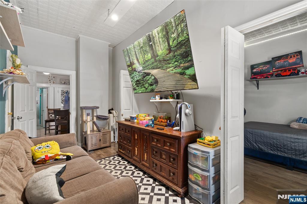 Incredible opportunity to own a low maintenance multi family home in one of West Orange's most sought after neighborhoods. With historically low inventory in the area, this property is a rare find for savvy investors and house hackers alike. Located less than 20 minutes from NYC and moments from major public transportation. 1st flr: 1 BR / 1 BA plus a partial finished basement used by the tenant perfect for a home office, gym, or recreation room. 2nd flr features 2 BR / 1 BA layout with great natural light. This 2 unit has minimal exterior maintenance, is occupied by reliable, long term tenants for immediate cash flow and has an unbeatable location close to shopping, dining, and commuting hubs. Opportunities in this market don't last. Book your private showing today and add this gem to your portfolio!