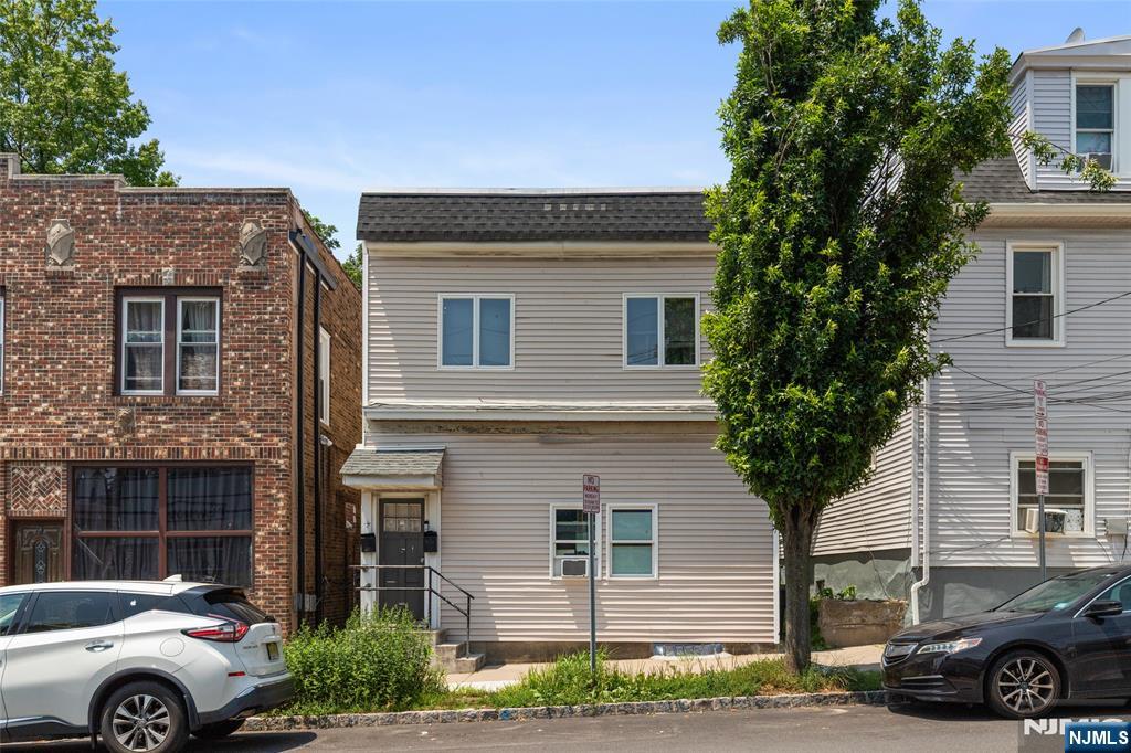 Incredible opportunity to own a low maintenance multi family home in one of West Orange's most sought after neighborhoods. With historically low inventory in the area, this property is a rare find for savvy investors and house hackers alike. Located less than 20 minutes from NYC and moments from major public transportation. 1st flr: 1 BR / 1 BA plus a partial finished basement used by the tenant perfect for a home office, gym, or recreation room. 2nd flr features 2 BR / 1 BA layout with great natural light. This 2 unit has minimal exterior maintenance, is occupied by reliable, long term tenants for immediate cash flow and has an unbeatable location close to shopping, dining, and commuting hubs. Opportunities in this market don't last. Book your private showing today and add this gem to your portfolio!