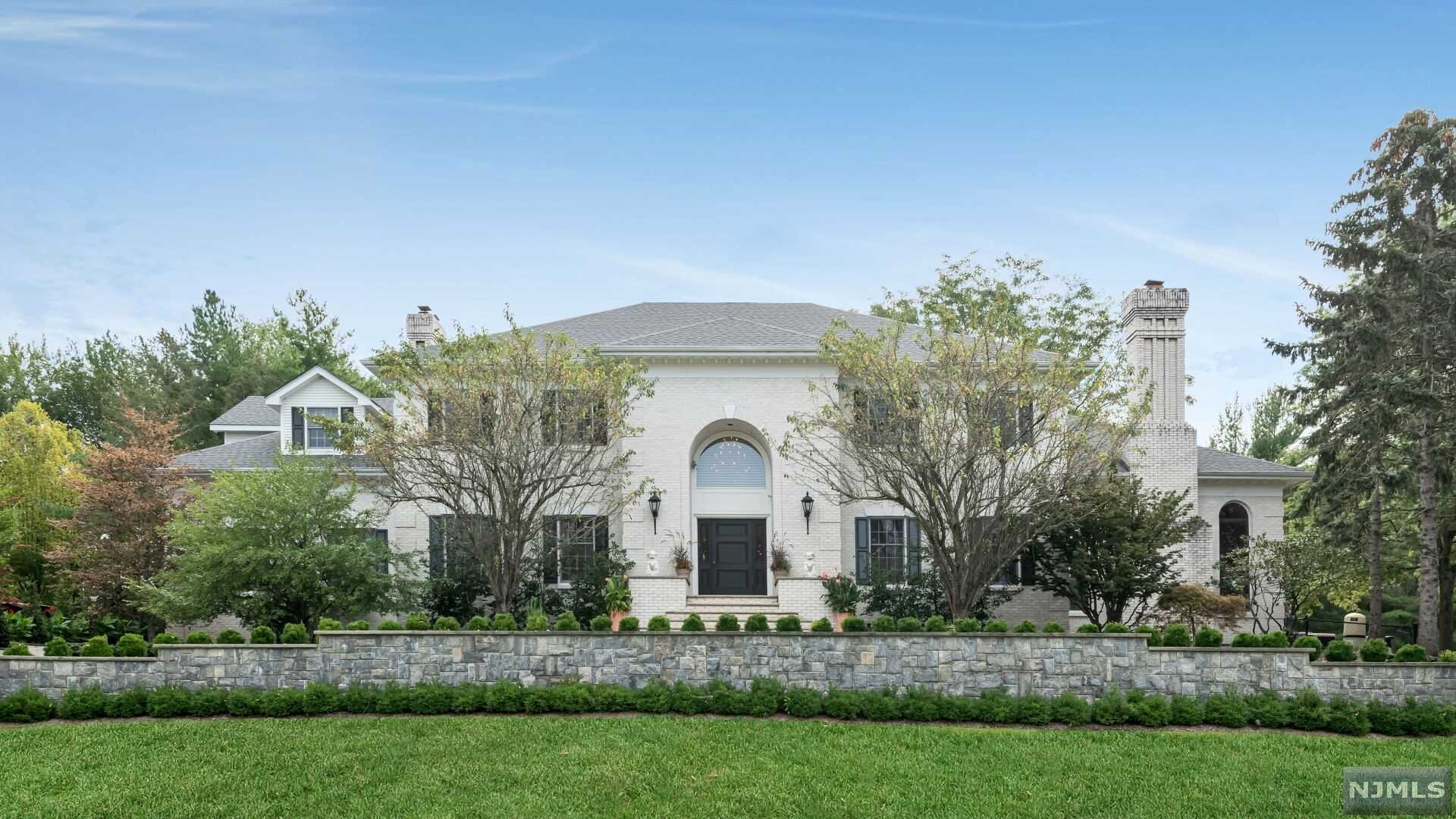 Welcome to your own private oasis. This stately custom center-hall brick colonial awaits a buyer who is searching for the perfect combination of pure tranquility and luxury. This 5 bedroom, 5 full and 1 half bath is like living in your own private resort. This custom built approximately 6,000 sq ft home is situated on almost 2 acres of rare park-like setting boasting a soothing stream and lush gardens. The private double tiered deck with gazebo overlooks the meticulously landscaped grounds with a private in-ground heated pool and spa. The full finished basement features its very own movie theater, game room, wine cellar, gym and sauna. This exquisite property is located in one of the most desirable and prime locations of Norwood, NJ.