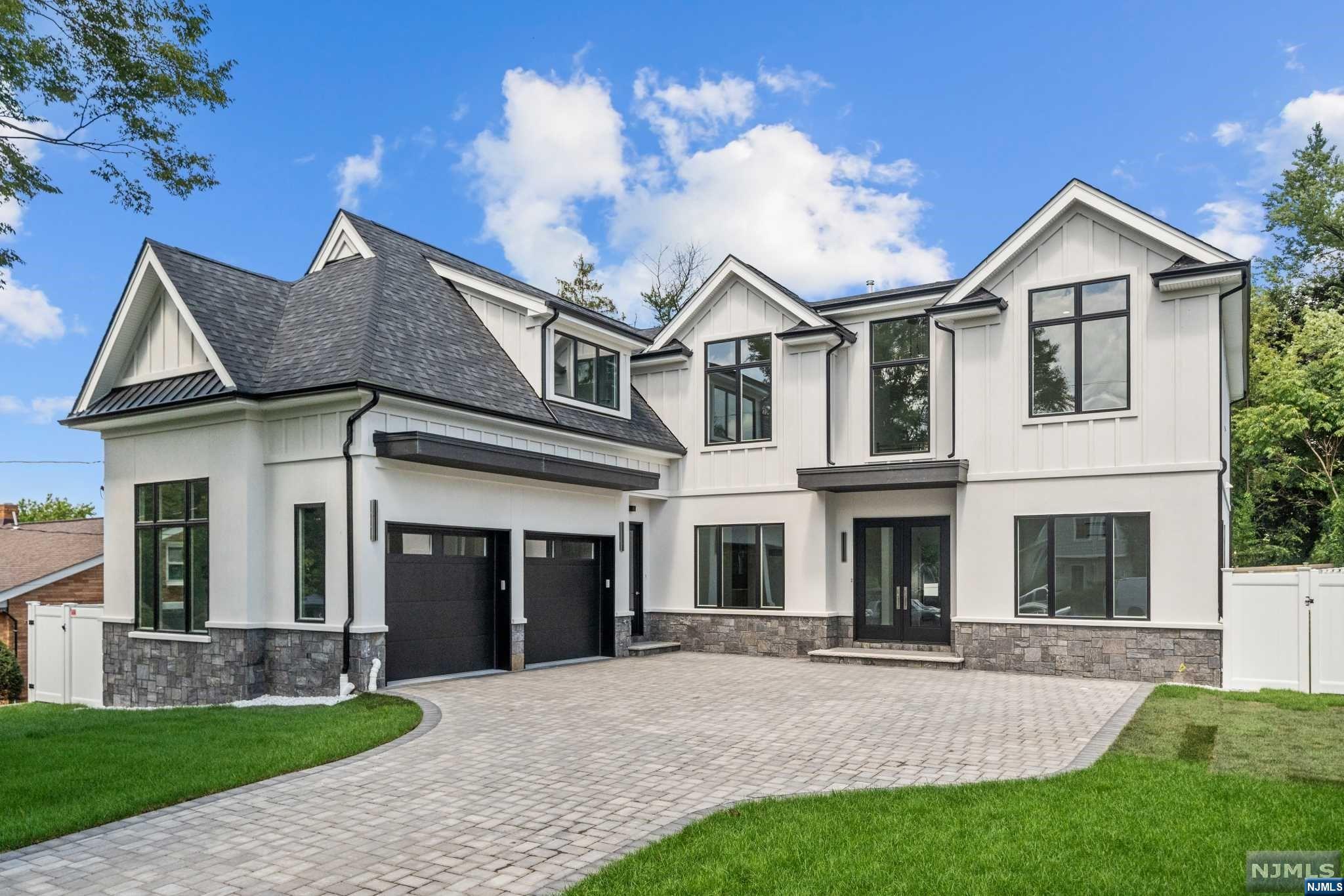 Spectacular L-Shaped 7 Bed, 5.5 bath BRAND NEW CONSTRUCTION masterpiece on the East Side of Paramus! Built by renowned local builder with a portfolio that speaks for itself. 7,000 Sq Ft of finished living space (on all 3 levels!) Extremely comfortable floor plan. 1st Floor boasts sweeping 2 Story Foyer. Formal Living & Dining Rooms, 1st floor Guest Bedroom w. Full Bathroom, STUNNING Chef's Kitchen w. Custom Cabinetry, Subzero, WOLF, & XO appliances, & Massive Center Island. Great Room, Powder Room, & OFFICE / LIBRARY or optional 2nd first floor Bedroom + Access to XL 2 car garage from Mud Room. 2nd Floor Features Primary Suite w. Double Walk-In-Closets & Primary Bathroom with Double Vanity, Soaking Tub, Glass Shower, & Water Closet. Jr Suite with Private Bathroom & 2 additional Bedrooms w a shared Jack & Jill Bathroom. Amenity-Filled Basement features Movie Theater, Gym, Rec Room, & another Bedroom w. Full Bath. Quiet, tree-lined street close to shopping, parks, & transportation.