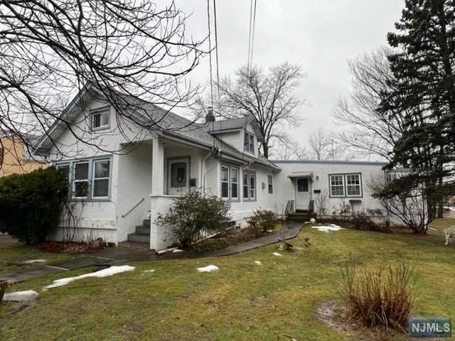 Great opportunity to buy a two family on an oversized lot. Just a short walk to Grant School and NYC buses.