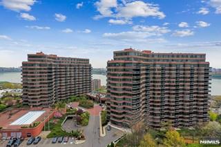 Perched on the 16th floor of the prestigious "Carlyle" this extraordinary 3,700+ sf residence offers a rare opportunity to create a truly one-of-a-kind mansion in the sky. Known for its exceptional white-glove service, amenities, and breathtaking NYC views! Enjoy spectacular vistas of the Hudson River stretching from north of the GW-bridge to south of the iconic Manhattan skyline & beyond. This expansive double-unit residence is poised for a complete custom renovation, allowing you to design and personalize every detail to your exact specifications. Included are designed plans from "Modiani" featuring a gourmet chef's kitchen, elegant eat-in dining area with custom window banquette, dining room banquet, and a grand double-sized living room highlighted by a custom shelving and wet bar. The layout offers 4 beds/4.5 baths, including a private south-facing primary suite with its own balcony, and dual walk-in closets. Plus add. private balcony with stunning panoramic view & room for a home office, the possibilities are endless. Upon your completion, this exceptional residence will provide the convenience of single-level living, and seamless indoor entertaining spaces. Includes: 2 garage parking spaces and 2 storage bins. Enjoy a lifestyle with white-glove concierge service, valet parking, a fitness center, outdoor pool, and more. Don't miss this rare opportunity to create your dream home in one of the area's most coveted luxury residences. Experience elevated living at its finest!