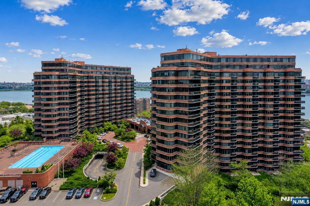 CAN BE SPLIT INTO 2 UNITS!! Perched on the 16th floor of the prestigious "Carlyle" this extraordinary 3,700+ sf residence offers a rare opportunity to create a truly one-of-a-kind mansion in the sky. Known for its exceptional white-glove service, amenities & breathtaking NYC views! Enjoy spectacular vistas of the Hudson River stretching from north of the GW-bridge to south of the iconic Manhattan skyline & beyond. This expansive double-unit residence is poised for a complete custom renovation, allowing you to design & personalize every detail to your exact specifications. Included are designed plans from "Modiani" featuring a gourmet chef's kitchen, elegant eat-in dining area w/ custom window banquette, dining room banquet & a grand double-sized living room highlighted by a custom shelving and wet bar. The layout offers 4 beds/4.5 baths, including a private south-facing primary suite with its own balcony, and dual walk-in closets. Plus add. private balcony w/ stunning panoramic view & room for a home office, the possibilities are endless. Upon your completion, this exceptional residence will provide the convenience of single-level living & seamless indoor entertaining spaces. Includes: 2 garage spaces & 2 storage bins. Enjoy a lifestyle with white-glove concierge service, valet parking, fitness center, outdoor pool & more. Don't miss this rare opportunity to create your dream home in one of the area's most coveted luxury residences. Experience elevated living at its finest!