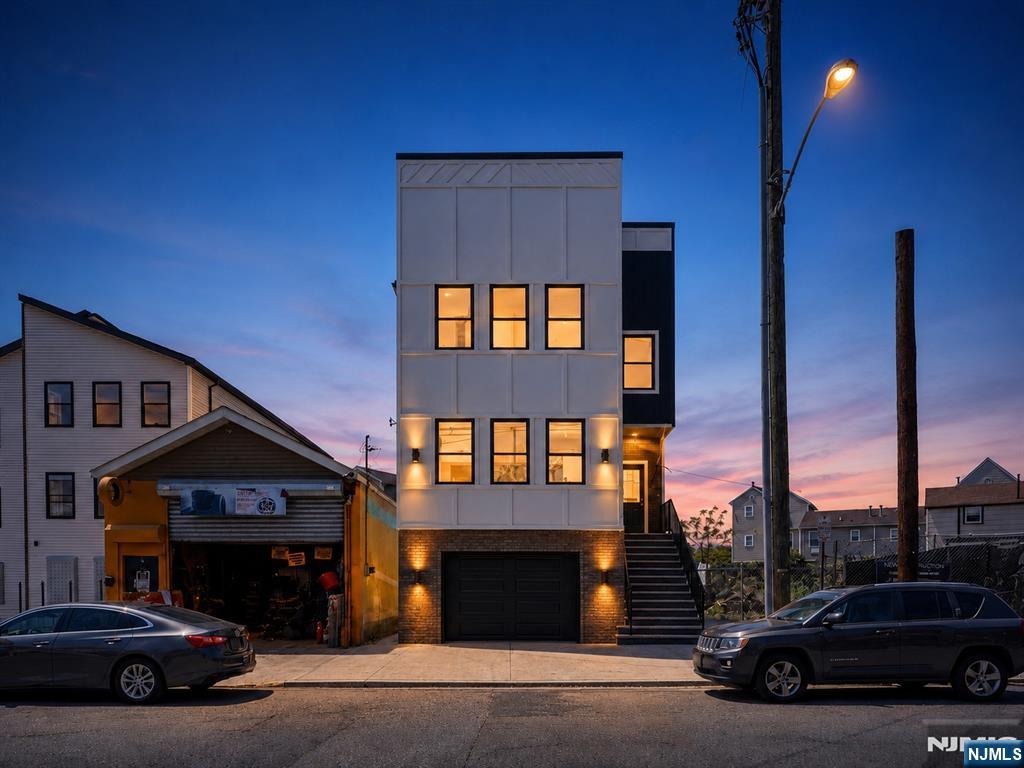 The new construction game has leveled up and you don't want to be left behind. This stunning brand new build, crafted by one of the town's most reputable developers. The ground level features a half bath and large space and offers both a side entrance and garage access. Each unit boasts 3 bedrooms and 2 full bathrooms, including a private primary suite, plus its own laundry area. Second floor unit and top-of-the-line finishes throughout quartz countertops, premium cabinetry, and two unique kitchen designs to choose from. Best of all, this property qualifies for a 5-year tax abatement. Don't miss the chance to see it today! Each property will have its own backyard and will be fenced off. With a total of 6 bedroomns 4.1 bathrooms, this is it!