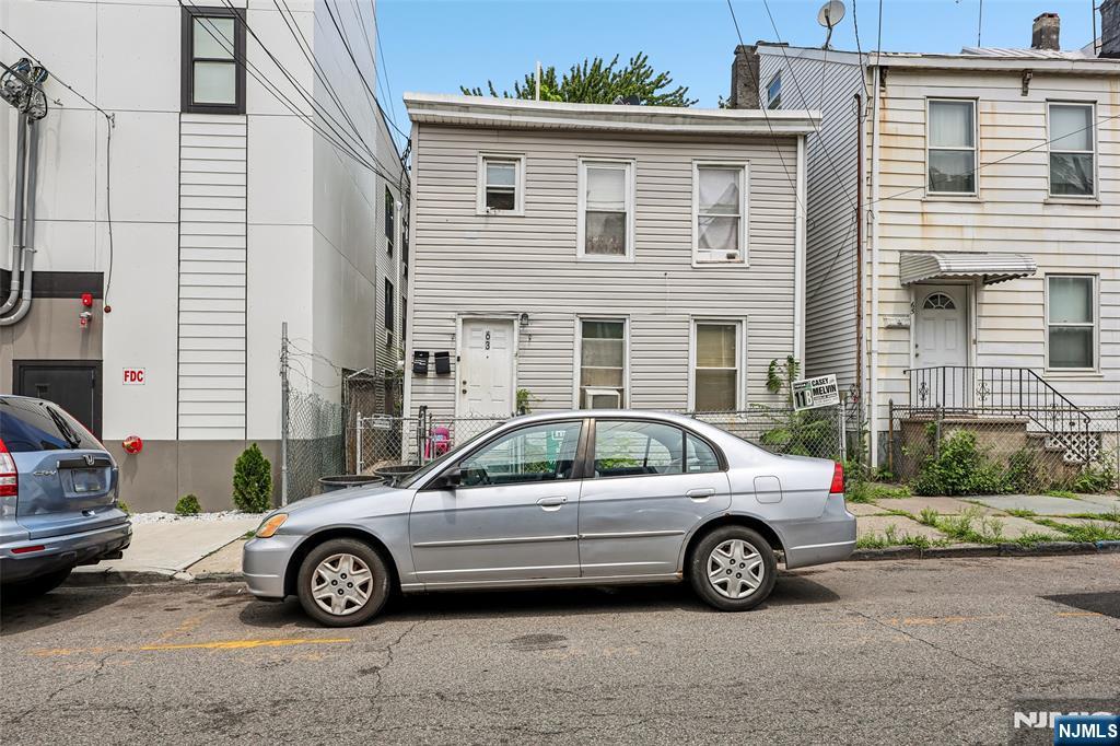 Donâ€™t miss this well-maintained 7 bedroom, 3 bathroom multifamily investment opportunity generating $5,200/month in total rent with all tenants on month-to-month leases â€” giving you maximum flexibility whether youâ€™re an owner-occupant or pure investor. Ideally located just blocks from the train station, bus lines, schools, shopping, and dining. Updated in 2020, this property is perfectly positioned for an owner-occupant to live in part of the home while collecting rental income from the rest, or for an investor to keep it fully leased for strong cash flow from day one. The first floor features a comfortable living room, eat-in kitchen, 4 bedrooms, and a full bath, offering generous space and functionality. The second floor includes a living room, eat-in kitchen, 3 bedrooms, and a full bath. The finished basement adds valuable bonus living space, further enhancing the propertyâ€™s versatility and value. Practical layouts and thoughtful updates enhance everyday living throughout. Outside, the fully fenced backyard includes a patio ideal for outdoor dining and grilling. With flexible living spaces, a finished basement, $5,200/month in existing rental income, month-to-month tenancy flexibility, and a commuter-friendly location, this is an excellent opportunity to own a versatile multifamily property in a convenient neighborhood