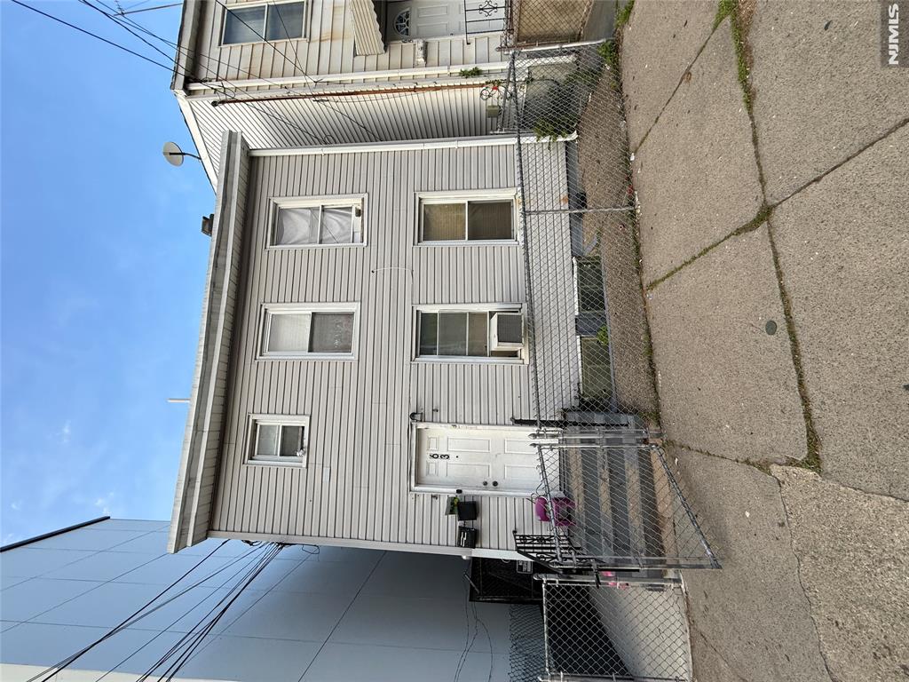 Donâ€™t miss this well-maintained 7 bedroom, 3 bathroom multifamily investment opportunity generating $5,200/month in total rent with all tenants on month-to-month leases â€” giving you maximum flexibility whether youâ€™re an owner-occupant or pure investor. Ideally located just blocks from the train station, bus lines, schools, shopping, and dining. Updated in 2020, this property is perfectly positioned for an owner-occupant to live in part of the home while collecting rental income from the rest, or for an investor to keep it fully leased for strong cash flow from day one. The first floor features a comfortable living room, eat-in kitchen, 4 bedrooms, and a full bath, offering generous space and functionality. The second floor includes a living room, eat-in kitchen, 3 bedrooms, and a full bath. The finished basement adds valuable bonus living space, further enhancing the propertyâ€™s versatility and value. Practical layouts and thoughtful updates enhance everyday living throughout. Outside, the fully fenced backyard includes a patio ideal for outdoor dining and grilling. With flexible living spaces, a finished basement, $5,200/month in existing rental income, month-to-month tenancy flexibility, and a commuter-friendly location, this is an excellent opportunity to own a versatile multifamily property in a convenient neighborhood