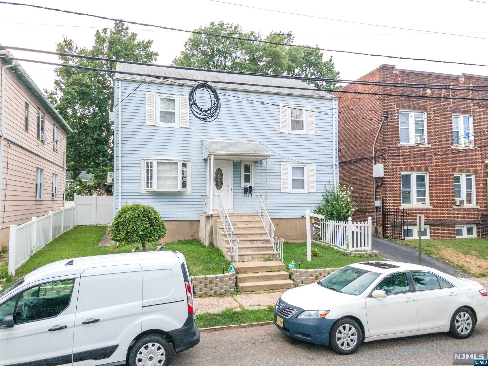 WELCOME TO THIS 2 FAMILY HOME LOCATED IN PASSAIC, BOARDER WITH CLIFTON, EXTREMELY CONVENIENT LOCATION, CLOSE TO MAJOR HIGHWAYS, SCHOOLS, TRANSAPORTATION AND SHOPPING CENTERS. 1ST FLOOR FEATURES 2 BEDROOM, KITCHEN, LIVING ROOM/DINING ROOM, FULL BATH. 2ND FLOOR 3 BEDROOM, KITCHEN, LIVING ROOM , FULL BATH. BASEMENT FINISHED WITH SEPARATE ENTRANCE. YOU MUST SEE IT, PROPERTY IN MINT CONDITION, HUGE YARD AND DRIVEAY FOR 3 CARS NO SHOWING TIME, NO SHOWING TIME