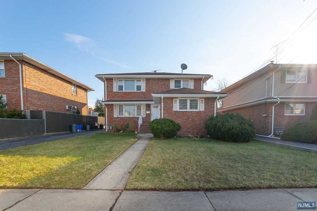 This Brick Lovely well maintained 2 family home located on a cul-de-sac has it all...the first floor has a generous eat in kitchen, spacious living area,& hardwood floors throughout. 3 bedrooms, 1.5 baths with a finished basement that is large enough for a great room and stairs to the backyard. The second floor has an eat in kitchen, Spacious living area, 2 bedrooms, 1 bath with ample closet space and attic. The Driveway fits 5 cars, large backyard, pool and minutes to major highways, and public transportation. Close to every convenience: great restaurants, shops, and more!