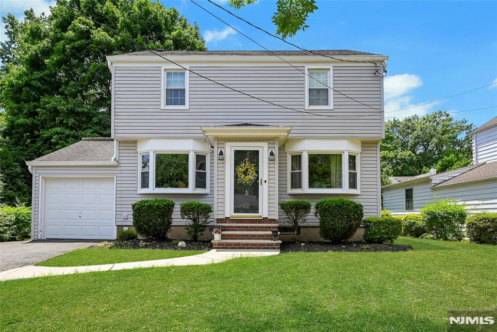 Welcome to this charming colonial in the highly sought-after town of River Edge. This well maintained home offers a spacious and inviting layout, featuring a large living room, formal dining room and kitchen that opens into a comfortable Family room with bright eating area, perfect for everyday living and entertaining. Upstairs, you'll find 3 Bedrooms and a Full Bath. The partiality finished lower level provides additional living space complete with full bath, making it ideal for a rec room, home office or guest area. Step outside to a lovely Deck overlooking a beautiful yard for outdoor dining, relaxing or entertaining! Conveniently located within walking distance to River Edge's highly regarded schools. close to transportation and local amenities . This home presents a wonderful opportunity to enjoy all that this desirable community has to offer, Don't miss this chance to make this property your own!