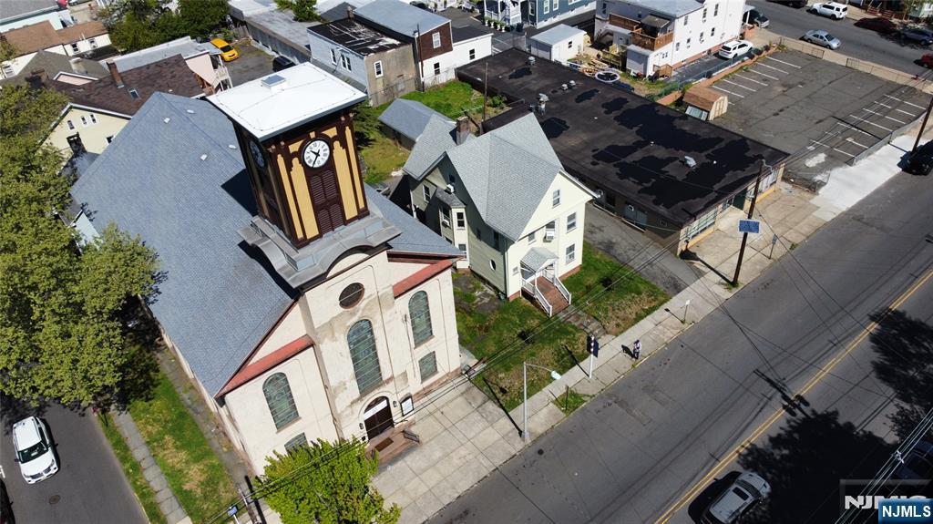 Rare opportunity to acquire a unique multi-building property featuring a Religious property complex consisting of a colonial pastoral residence, day care center with approximately 7,500 sq. ft., and an attached parking lot for approximately 19 vehicles. This versatile campus-style property offers excellent potential for religious, educational, community, nonprofit, or special-use purposes. The House of Worship building provides dedicated worship, assembly, and community space and boasts a full kitchen, adding flexibility for events, gatherings, and community functions, and it's considered a Historical Landmark. The day care center also features a full kitchen and offers substantial space (approx. 7500 Sqf) suitable for classrooms, child care operations, offices, programming, or other approved uses. The pastoral home is a colonial-style residence featuring 4 bedrooms and 3 baths, offering convenient on-site housing, staff residence, administrative use, or additional flexibility.This property presents a rare combination of institutional, residential, educational, and community-oriented functionality in one location. Ideal for an owner-user, expanding congregation, community organization, educational operator, or investor seeking a special-purpose property with multiple possible uses.