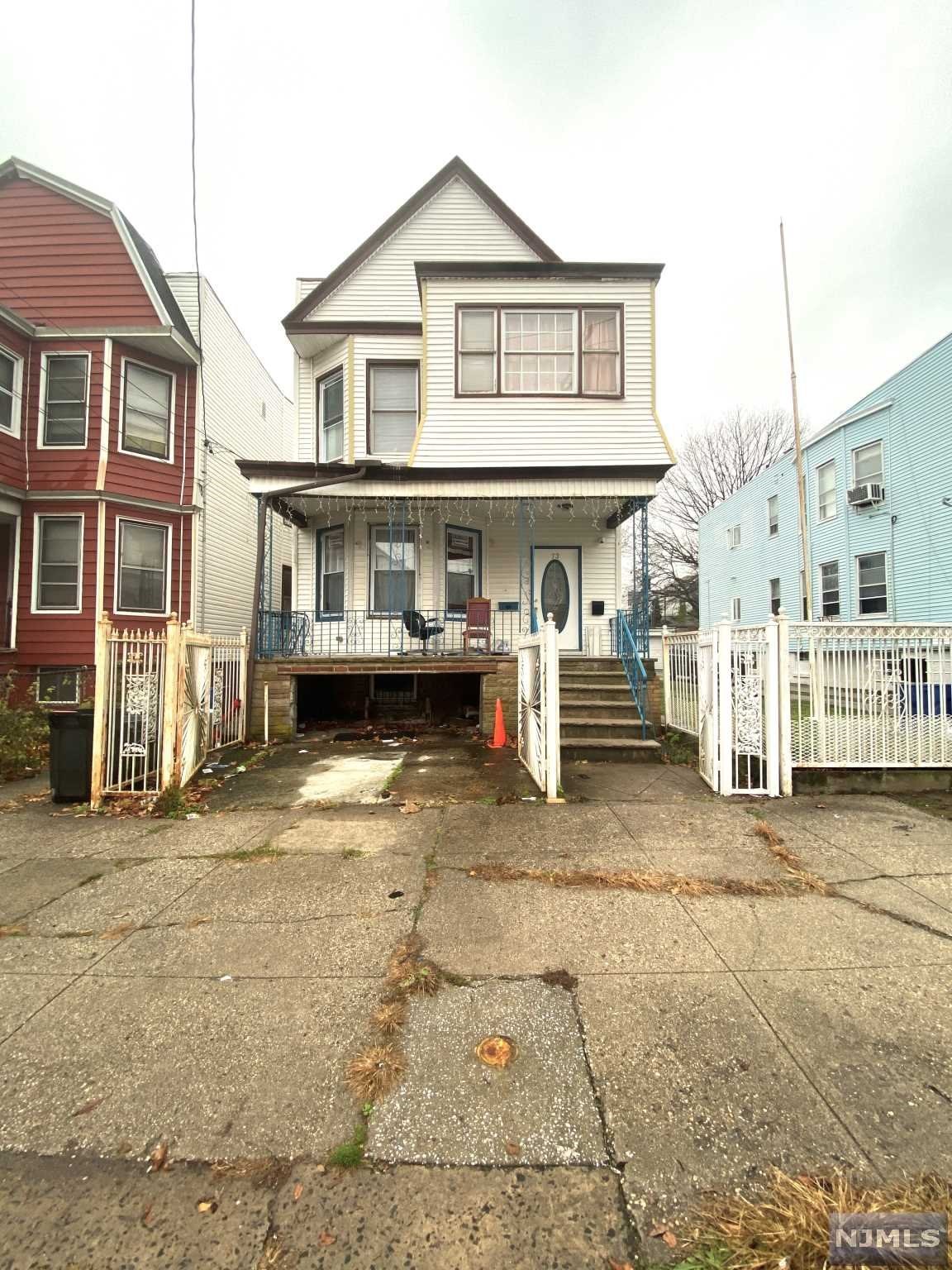 Great Investment opportunity or chance to become a homeowner! This spacious Two-family home just needs a little TLC and boasts a large backyard and deck for entertaining. The 1st floor unit features a large living room with plenty of natural light, eat in kitchen, three bedrooms, one full bathroom, and access to the backyard. The 2nd floor unit offers a large living room, eat in kitchen, three generous bedrooms, one full bathroom, and an additional large den. The basement is also finished. This property is located close to all major NYC transportation. Don't miss out won't last long.