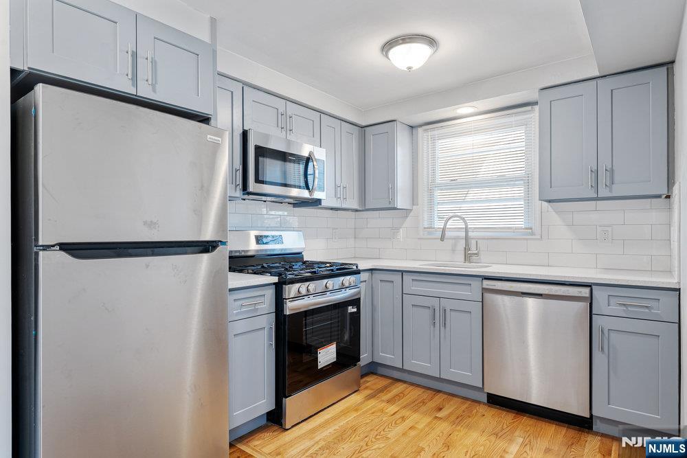 Welcome Home! Step into this stunning, fully renovated 2-bedroom, 1 bath second-floor apartment. A perfect blend of comfort, style, and convenience! Every inch of this home has been updated to provide a move-in ready living experience you'll love coming home to. Enjoy brand new stainless steel appliances, quartz countertops, hardwood flooring, new energy-efficient windows, fully remodeled kitchen with dishwasher, and fully remodeled bathroom. The layout creates a bright, welcoming atmosphere ideal for relaxing or entertaining. Close to local restaurants, cafes, and schools. Easy NYC bus transportation. Basement has small area for storage. Washer/dryer hook up in basement. Use of yard. This home truly has it all, modern updates, and great location. Don't miss out! Schedule your private showing today and make this your new home! It is available immediately.