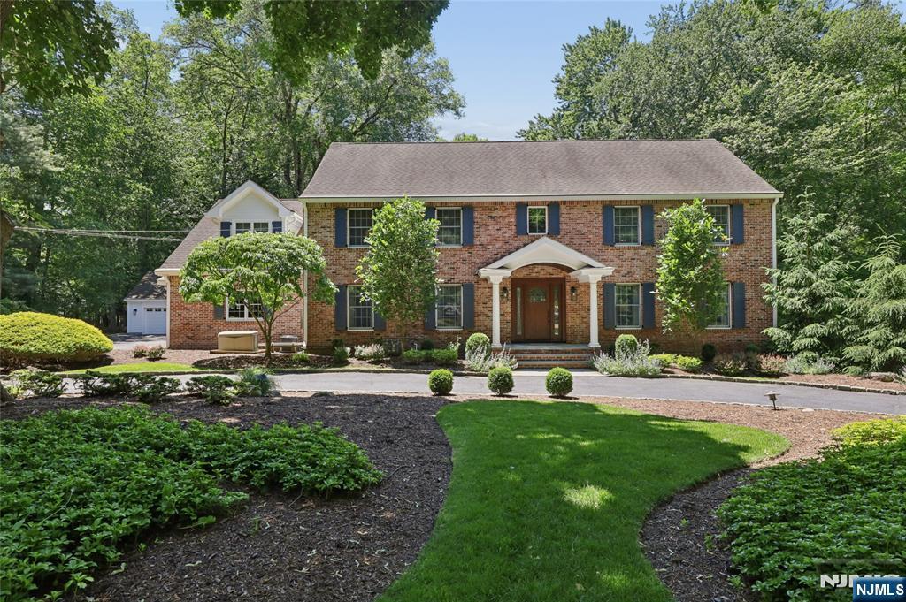 Welcome to 27 Duane Ln, a classic Colonial offering over 4,000 sft of living space (1st & 2nd Fl) on a spectacular 1.85-acre property in one of Demarestâ€™s most coveted & picturesque locations. This remarkable estate is surrounded by sweeping natural beauty & offers rare privacy, breathtaking views & a peaceful, resort-like setting that can be enjoyed throughout every season. The main level features a welcoming center hall foyer, living rm, formal dining rm, inviting den w/fpl, spacious family rm, powder rm & convenient laundry rm. The kitchen serves as the heart of the home, complete w/a center island, dining area & direct access to a covered deck overlooking the magnificent backyard & serene natural landscape. Whether enjoying morning coffee, outdoor dining, or relaxing w/family & friends, the setting is truly extraordinary. The 2nd level boasts a primary suite w/WIC, office & bath w/radiant heated floors. 4 add'l BRs & 2 full baths provide ample space & comfort for family & guests. The finished walk-out lower level offers outstanding versatility w/a recreation rm, full bath, gym & abundant storage space. Additional highlights: wood floors, skylights, 4-zone BB heat, 3-zone c/a, generator, EV charger, attached 3-car garage and a bonus oversized detached 2-car garage. A rare opportunity to own one of Demarestâ€™s premier properties, combining timeless elegance, exceptional functionality & an unparalleled natural setting in one of Bergen Countyâ€™s most desirable communities