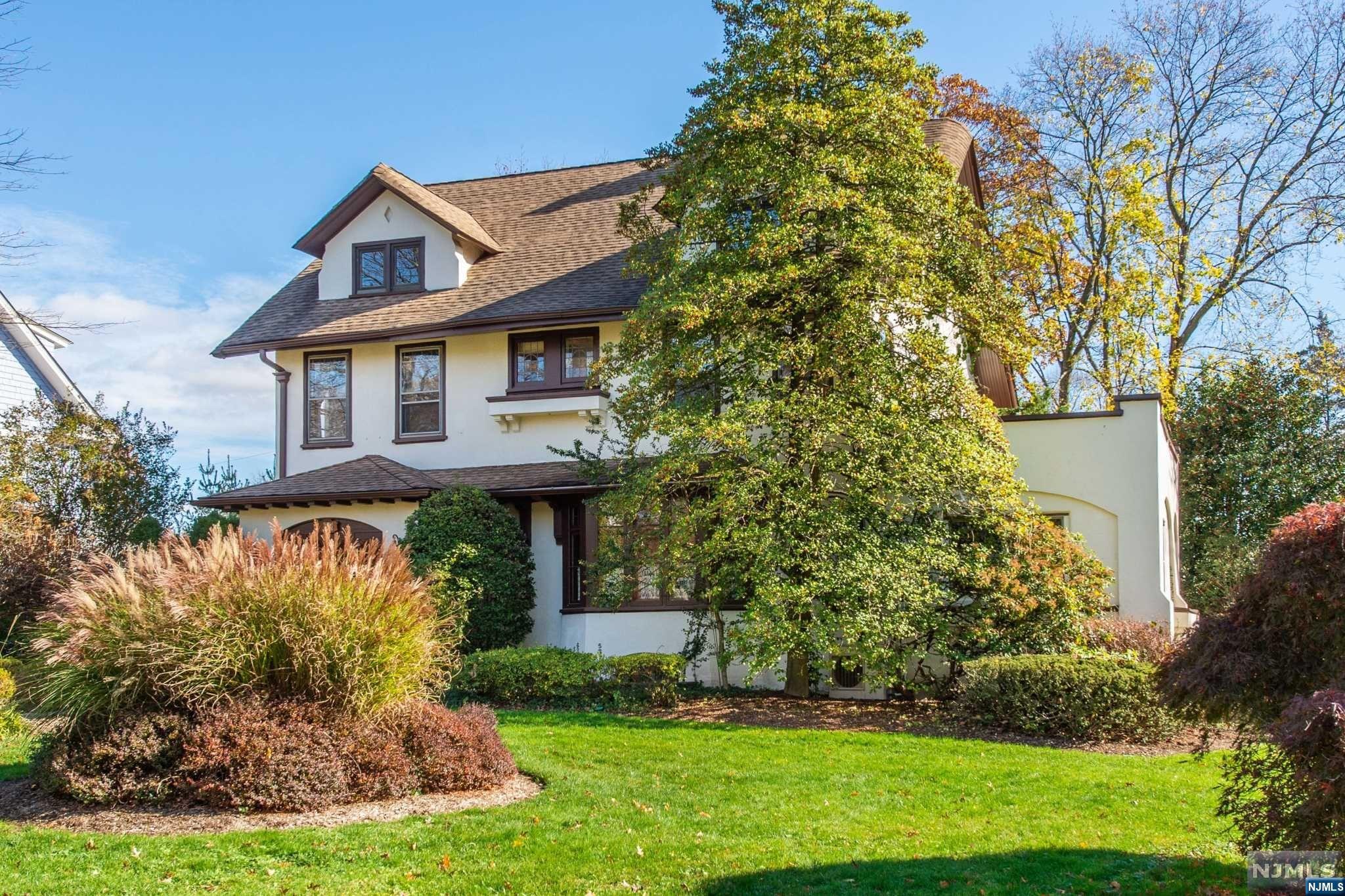 Location is key for this lovely Colonial in the prestigious Erwin Park section of Montclair! This charming 6 bedroom, 3 full and 2 half bath home has over 3200 s.f. of living space. Great opportunity to own & add your very own personal touch. The main level features the grand entry foyer, formal living room with wood burning fireplace, den, formal dining rm, kitchen, laundry rm & powder rm. The second level features the Primary Bedroom w/ensuite with a wood burning fireplace plus 3 addl bedrooms & another full bath. The third level features 2 addl bdrms, an office and a full bath. The basement has a 1/2 bathroom, as well as plenty of space for storage and can be finished with a possible wine cellar and extra rooms for entertainment. Other features include a newer water heater, sprinkler system, chestnut trim, cedar closets and wood flrs. Close to NYC train, Watchung Plaza, beautiful Edgemont Park, shopping, restaurants & much more!