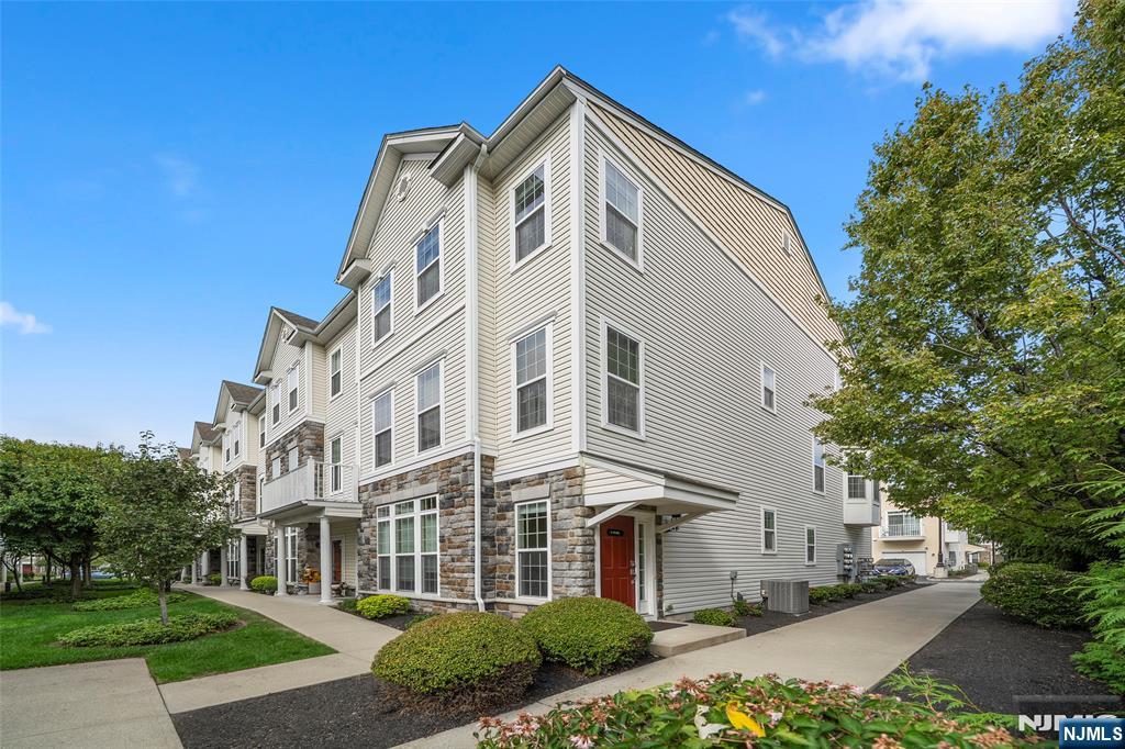 LIVE IN STYLE IN THIS BEAUTIFULLY-MAINTAINED TOWNHOUSE. PARK COMFORTABLY IN THE AMPLE ONE CAR-GARAGE THEN WALK UP TO THE SECOND FLOOR WHERE YOU'LL FIND A POWDER ROOM, OPEN CONCEPT KITCHEN, DINING ROOM/LIVING ROOM, WITH LOTS OF NATURAL LIGHTS THROUGHOUT THE LARGE WINDOWS FACING WEST AND SOUTH, LAUNDRY ROOM, AND UTILITY ROOM. GO UPSTAIRS TO THE THIRD FLOOR WHERE YOU'LL BE GREETED BY A HALLWAY THAT LEADS TO LARGE MASTER BEDROOM WITH JACUZZI, STANDUP SHOWER, CLOSET AND LARGE VANITY AND MIRROR, 2 WALK IN CLOSETS, SECOND BEDROOM WITH WALK-IN CLOSET, FULL BATHROOM, DEN THAT CAN BE USED AS TV ROOM OR EVEN A 3RD BEDROOM. ENJOY LIVING THE COMFORTABLE AND DESIRABLE AMENITIES SUCH AS CLUB HOUSE, POOL, AND COURTYARD. THIS COMMUNITY IS TUCKED AWAY IN QUIET PART OF GARFIELD BORDERING ELMWOOD PARK, LODI, AND CLIFTON NEAR MAJOR TRANSPORTATION ARTERIES SUCH AS ROUTES 46, 4, 17, 80, NEAR HOUSES OF WORSHIP, SCHOOLS, RESTAURANTS, A SHORT DRIVE TO WESTFIELD GARDEN STATE PLAZA IN PARAMUS.