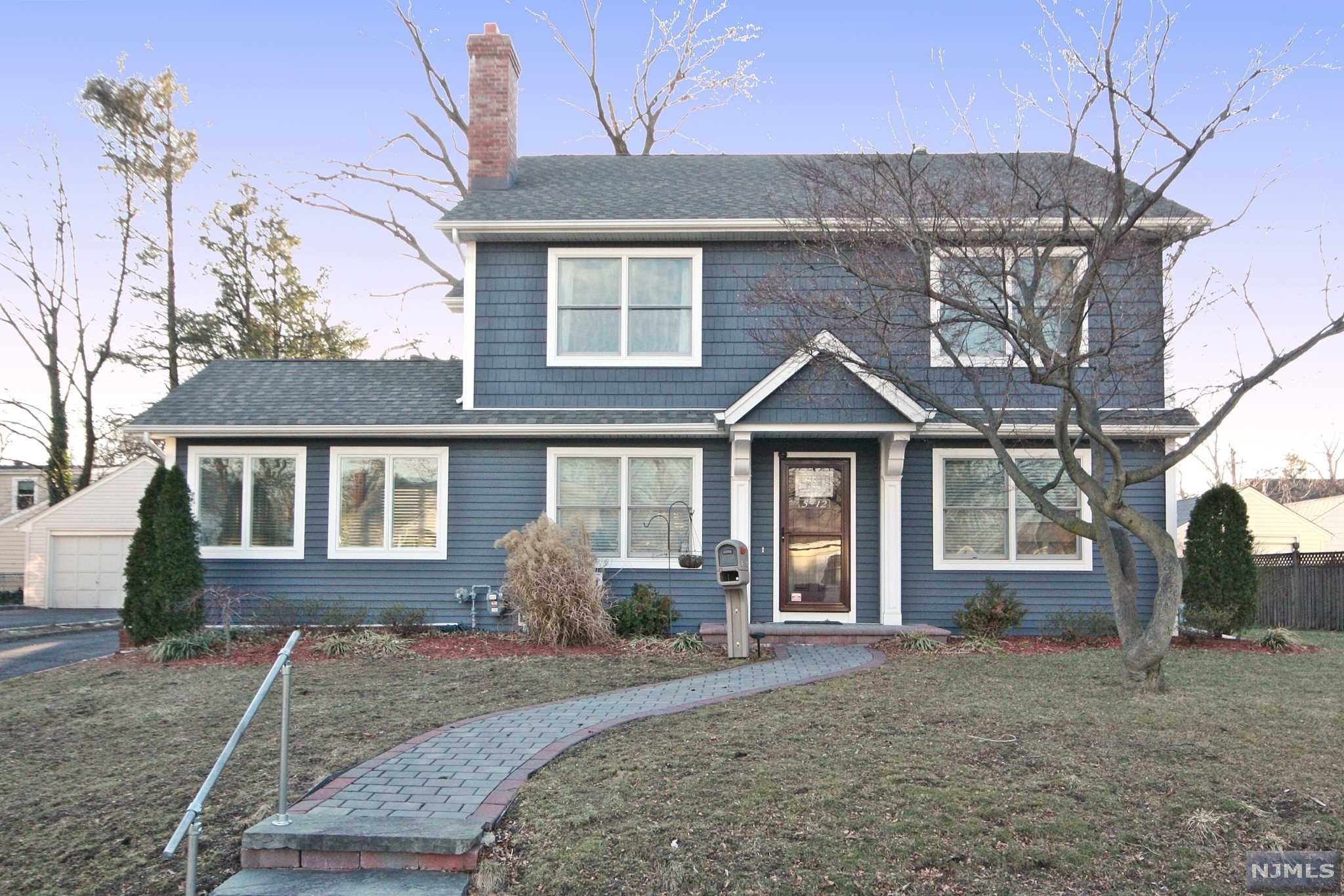 Spectacular 3 1/2 years young 4 bedroom, 3 full baths, approx. 2,510 SF living space center hall colonial on existing foundation (75x100 lot) built in 2018. This luxury home is bright and open with enhanced details and upgraded. Entry foyer is open to living rm, family rm w/wood-burning fireplace, dining area with bay window, beautiful custom built modern eat in kitchen with granite countertops and black SS appliances. 1st floor also has bedrm, full bath and bright sunroom with cathedral ceilings overlooks the nicely maintained backyard. Upstairs find the master suite with 2 walk-in closets and spacious master bath with double vanity and sep bath. Two additional generously sized rooms that share a hallway full bath and upstairs laundry room. Basement is full, painted walls and floors, ready for your plan of home office, rec rm & gym. 2 car detached garage. 2 zone central A/C. Easy access to major highways RT4, RT208 and RT80. Close to NYC bus station and schools. MUST COME SEE!!