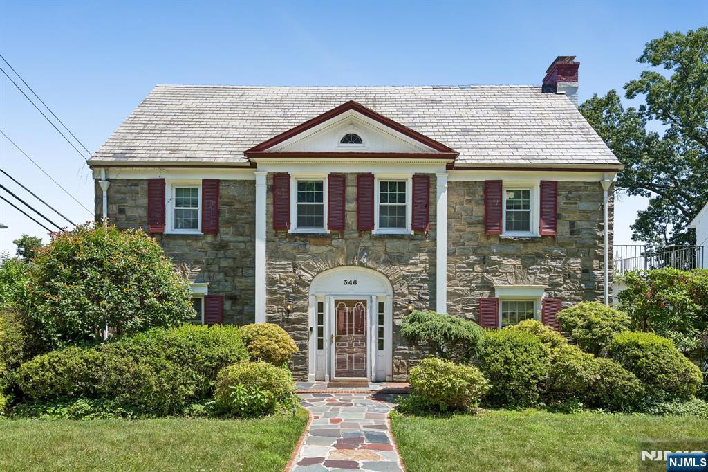 Welcome to this stately 1932 center hall colonial set in the coveted Newstead section of South Orange, a neighborhood known for its tree-lined streets, architectural significance, and sweeping hillside views. Nearly a century of character is reflected throughout the home, from the gracious foyer to the expansive formal rooms that offer exceptional flow for entertaining. The sun-filled breakfast room, large dining room, and grand living room create warm, inviting spaces anchored by original details that define the era. A fully finished walk-up attic adds additional bedrooms and a full bath, providing flexible options for guests, work-from-home needs, or future customization. The home's elevated position delivers a stunning NYC skyline view a rare and unforgettable backdrop that enhances everyday living. With generous room sizes, classic proportions, and unlimited potential to renovate or restore, this property presents a unique opportunity to tailor a timeless home in one of South Orange's most sought-after neighborhoods. Homes of this scale, history, and location are seldom available, making this a truly special offering. This home is being offered strictly AS IS, no requests for repairs will be considered.