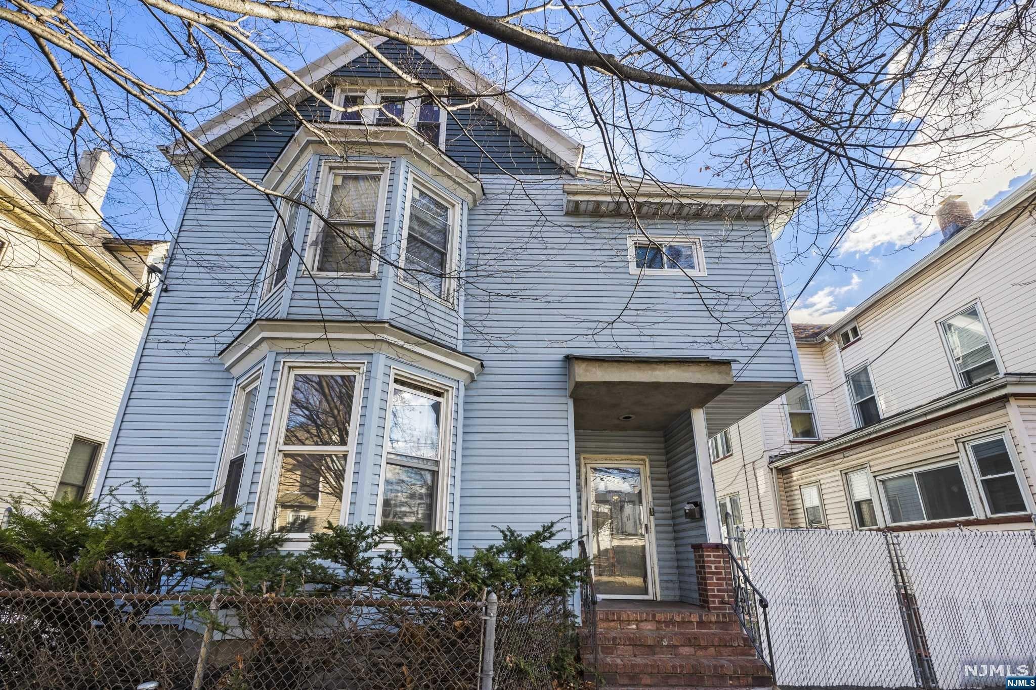 Investors special Legal 2 family with a massive 3rd fl bonus Unit 1 offers 1 bedroom 1 bath. Unit 2 offers 4 bedrooms 2 bath Light TLC is needed. The seller prefers Cash & hard money Buyer responsible for all city inspections