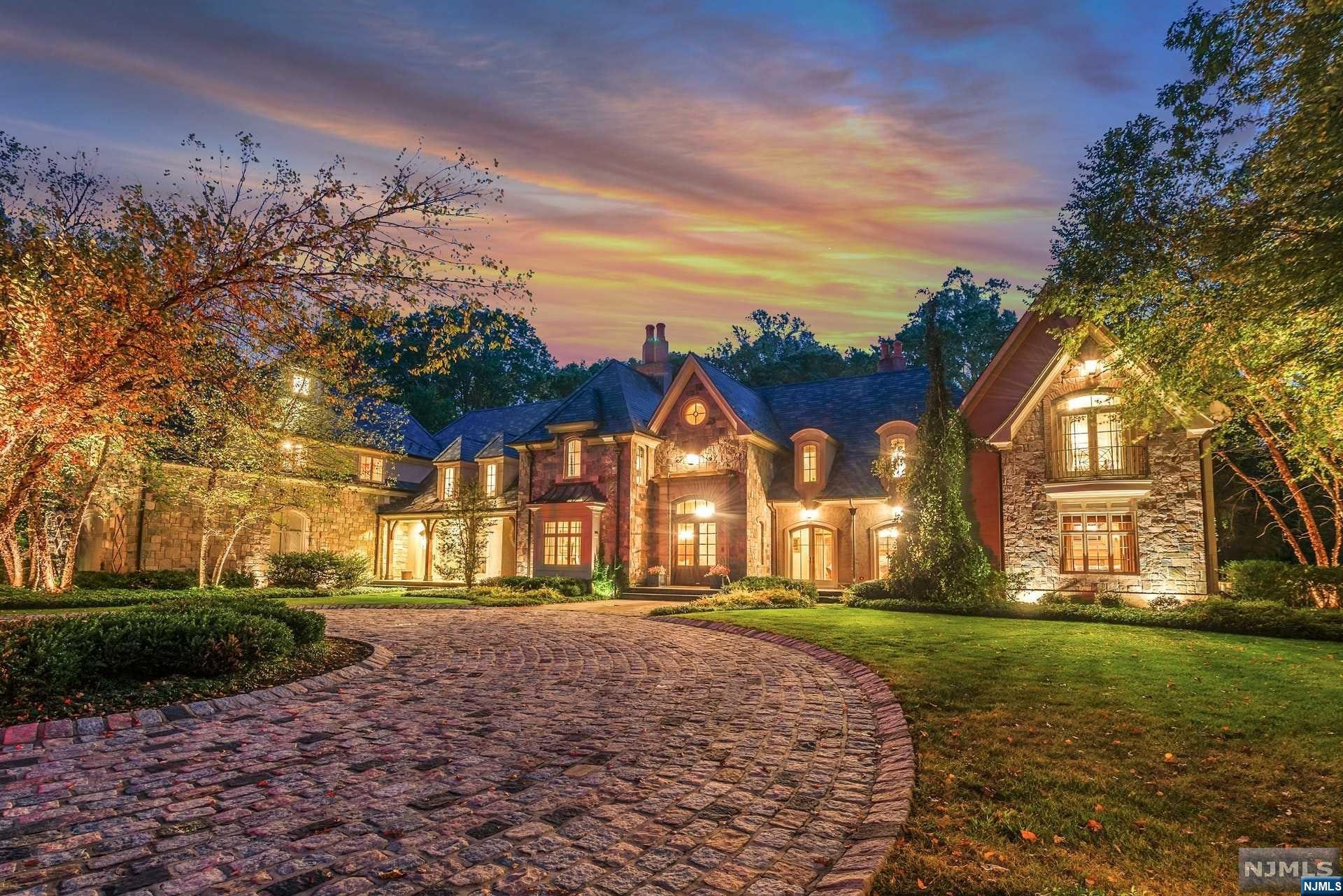 Welcome to this amazing 5 bedroom, 7 full and 2 half bath manor-style estate set on 2 flat acres on a cul-de-sac in the sought after Chestnut Ridge section of Saddle River. This spectacular home was constructed with the highest quality materials and custom craftsmanship throughout including the dramatic 3-story staircase, state-of-the-art Smart Home System, gourmet eat-in kitchen with stainless steel appliances and 7 fireplaces with custom screens. Other features of this incredible estate include a family room with custom bar on the second floor, 22 zones of radiant heat throughout, a temperature-controlled wine room and home theater in the full finished basement as well as a 4-car garage with lift to accommodate a 5th car. The meticulously manicured grounds are a must see with an in-ground heated Gunite pool, custom cabana and outdoor grill perfect for entertaining guests.