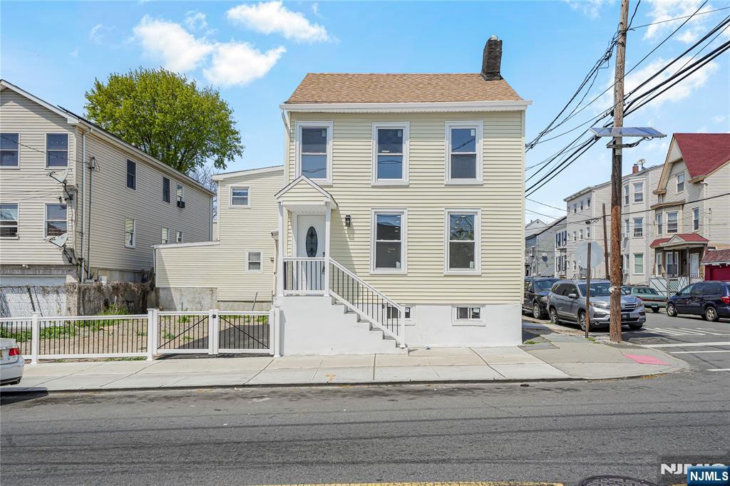 Beautifully renovated and move-in ready, this charming home in the heart of Paterson offers the perfect blend of modern style and everyday functionality. The inviting open-concept floor plan seamlessly connects the spacious living room to the updated kitchen, creating an ideal setting for both entertaining and daily living. Featuring 4 bedrooms and 1.5 bathrooms, the home also includes a convenient first-floor full bath with washer and dryer hookups. It has an unfinished basement which provides additional storage space. Ideally located near major highways, parks, houses of worship, shopping, dining, and public transportation, this home offers both comfort and convenience in a prime location.