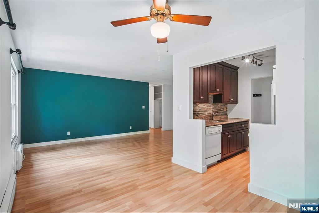 Great opportunity to own this clean and well-maintained one bedroom, one full bath condo in desirable Pompton Lakes. This unit is move-in ready while offering plenty of potential to make it your own! Offering a functional layout, ideal for both everyday living and entertaining, the spacious living room flows seamlessly into a dedicated eat-in dining area. The well-maintained kitchen features warm cherry cabinetry, granite countertops with ample prep space for cooking, and a stylish backsplash adding modern appeal to this move-in ready home. The generously sized bedroom offers neutral carpeting and an oversized closet wall with generous storage and plenty of space to create a comfortable retreat. Perfect for owner occupants or investors alike, with excellent rental potential. Conveniently located near shopping, dining and scenic hiking trails. Laundry located in lower level, plenty of parking available. Pool and tennis court closed. Pets allowed.