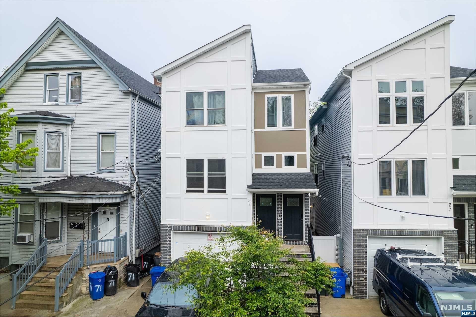 Built in 2021, this property can still be considered new construction. The exquisite 2 family home has an additional Room and bathroom on the ground floor. Each Unit Features a Master Bedroom, that includes a Walk In Closet, Full Bathrooms, 2 Bedrooms, Main Bathroom, Kitchen, Open Large Concept Living/Dining Room. The Ground Level features a Recreational Room and Family Room with Full Bathroom and Laundry Room. Will be delivered vacant. 1st Fl is almost identical to 2nd Fl with entrance to garage and ground fl. A Must See!