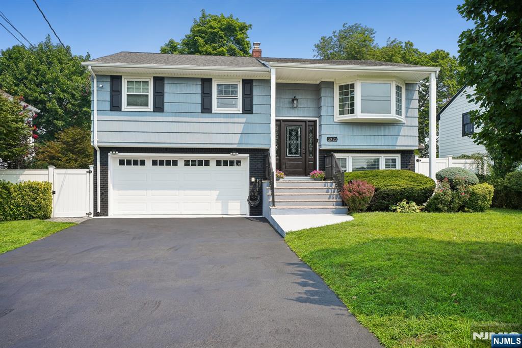 For a private showing please call 201-913-6678. Pride of ownership shines throughout this exceptionally well cared for 4-bedroom, 2.5-bath bi-level, offering the perfect blend of comfort, functionality & timeless appeal. Every space has been thoughtfully maintained, creating a home that is warm, inviting & ready for its next chapter. The main level features a spacious living room filled with natural light, formal dining room, updated kitchen, three generously sized bedrooms & one and a half baths. The lower level offers exceptional flexibility with a family room, fourth bedroom, full bath & direct access to the backyard & oversized two-car garage, making it ideal for guests, extended living or home office. Over the years, the home has been thoughtfully updated with quality improvements, including a renovated kitchen & bathrooms, newer windows, roof, central air, electrical & many additional upgrades that provide lasting value & peace of mind. Step outside to your own private backyard retreat featuring an expanded TimberTech deck, patio with fire pit & a beautifully landscaped, fully fenced yard with an underground sprinkler system. Whether entertaining friends or enjoying a quiet evening outdoors, this backyard was made to be enjoyed. Ideally located in the highly regarded Milnes Elementary School district & just minutes from parks, shopping, dining, major highways, & NYC transportation, this home offers the perfect combination of location, lifestyle, & thoughtful updates.