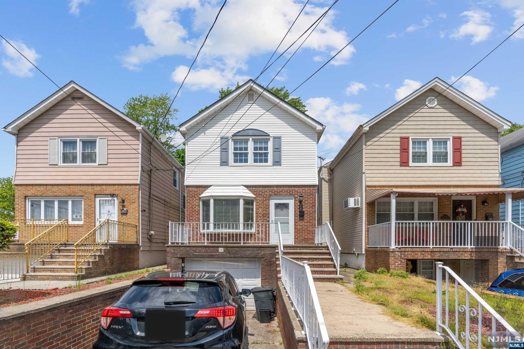 Escape to tranquility in this charming single home nestled on a quiet dead-end street in Bayonne, NJ. This inviting residence boasts 3 bedrooms, 1.5 bathrooms, an open-concept living room, a dining room, and a modern kitchen with an island, a firewood fireplace, and all seamlessly connected for effortless entertaining. Step outside to the deck with direct access to a large backyard, perfect for outdoor gatherings. Enjoy year-round comfort with central AC and take advantage of the partially finished basement with a laundry room and attached garage for one car and driveway for a second car. Don't miss out on this peaceful retreat. Contact us now to schedule a visit! New Photos coming soon!!!