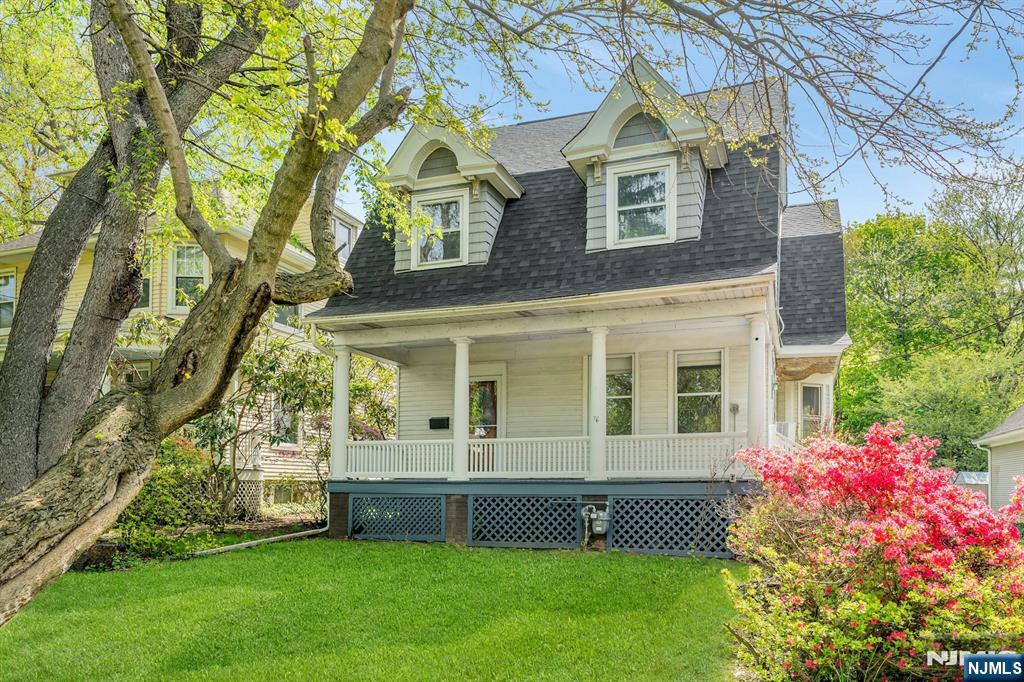 Nestled on a premier street in Tenaflyâ€™s highly sought-after East Hill, this historic Dutch Colonial offers timeless charm, exceptional space, and is ready for your personal touch. A classic covered front porch sets the tone, welcoming you into a grand center foyer highlighted by soaring ceilings and a sweeping staircase. Designed for both elegant entertaining and everyday living, the home features an expanded family room flowing effortlessly from the formal living and dining rooms. Tucked privately off this space is a unique first-floor suiteâ€”complete with a bedroomâ€”offering a rare and flexible layout ideal for a secluded guest wing, quiet home office, or multi-generational living. With 7 spacious bedrooms and 3 full bathrooms, this residence provides abundant room to accommodate a variety of lifestyles. Whether you choose to renovate or expand, the possibilities here are exceptional. Tenafly offers top-rated schools, shopping, houses of worship, and direct commuter bus service to NYC. Sold in as-is condition.