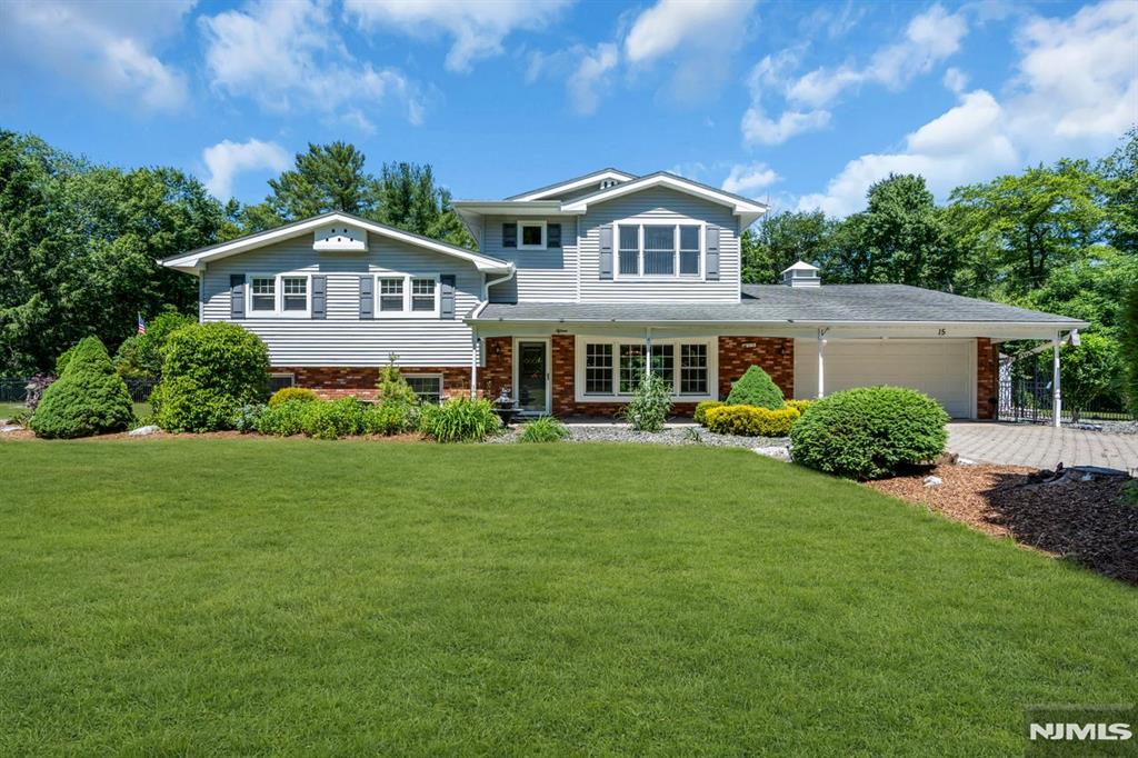 Gorgeous 3-bedroom split-level in the heart of West Milford, offering a blend of privacy, space, and scenic surroundings. Experience the charm of suburban living where open space and a picturesque setting create your own personal retreat. The main level features a bright living room, dining area, and kitchen, providing an ideal layout for everyday living and entertaining.The second level offers 2 bedrooms, including one with a private bath, a full main bath, and a bonus room that can serve as a potential fourth bedroom, home office, or flex space. The third level is dedicated to a private primary suite complete with a spacious bedroom, sitting area, office space, and full bath.The lower level features a recreation room, an additional room ideal for guests, a home gym or office, plus utility room. A separate entrance from the rear patio adds convenience and flexibility. Enjoy beautiful views overlooking the backyard, expansive patio, and in-ground swimming pool.Step outside and discover your own backyard oasis. The patio surrounds the pool and overlooks a beautifully landscaped yard, creating the perfect setting for summer gatherings, celebrations, or peaceful relaxation.Highlights include an oversized two-car garage, multiple storage sheds, updated HVAC system, and newer hot water heater. Combining space, versatility, privacy, and exceptional outdoor living, this home truly checks all the boxes. Don't miss the opportunity to make this incredible property your own.