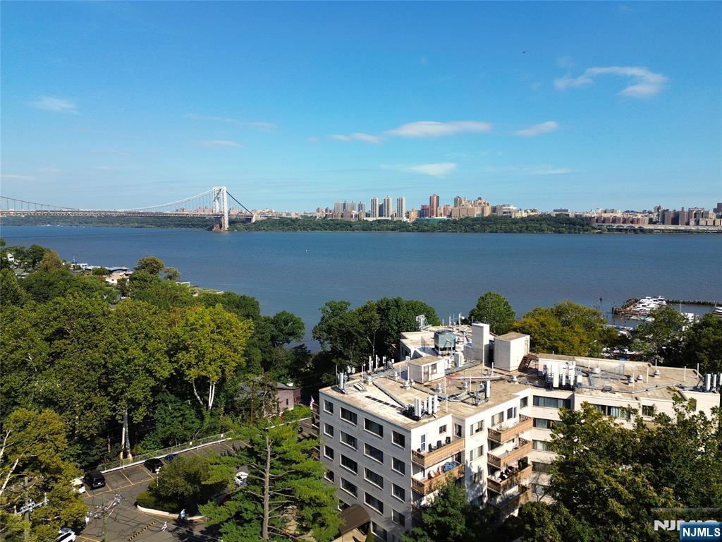 Welcome to Caribbean House, a boutique waterfront co-op in Edgewater with a prime location for commuters. This turnkey one bedroom home is approximately 900 sq ft and features an open layout, updated kitchen with granite countertops and stainless steel appliances, oversized closets, and a renovated bath. The space provides comfortable living and dining areas with abundant natural light. This well maintained complex boasts amenities that include a pool overlooking the Hudson River and marina, elevator, laundry on each floor, and optional storage. One assigned parking space is included, and the monthly maintenance covers taxes, heat, gas, hot water, parking, cable, internet, and pool. Conveniently located near shops, dining, and parks, with the bus at the door and a complementary shuttle to the Edgewater Ferry for an effortless NYC commute