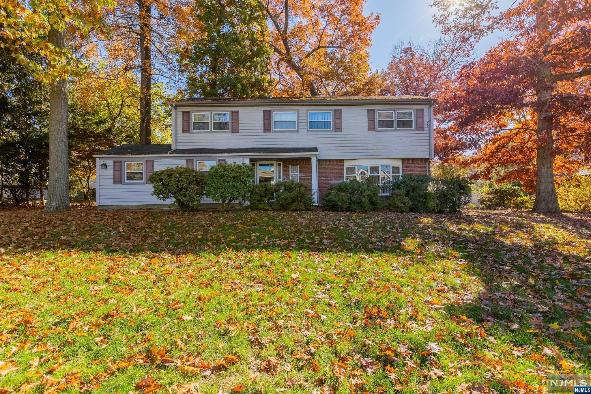 Come and see this spacious split level home with a southern exposure located in a quiet, desirable neighborhood! Vaulted ceilings in living room/dining room, generous size rooms and closet space. Hard wood floors throughout living room, dining room and bedrooms. Great yard with patio for entertaining on this 100 X 100 lot with mature trees. Unfinished basement with tremendous potential. Close to major highways and local schools. Imagine adding your own style to make this house your home!